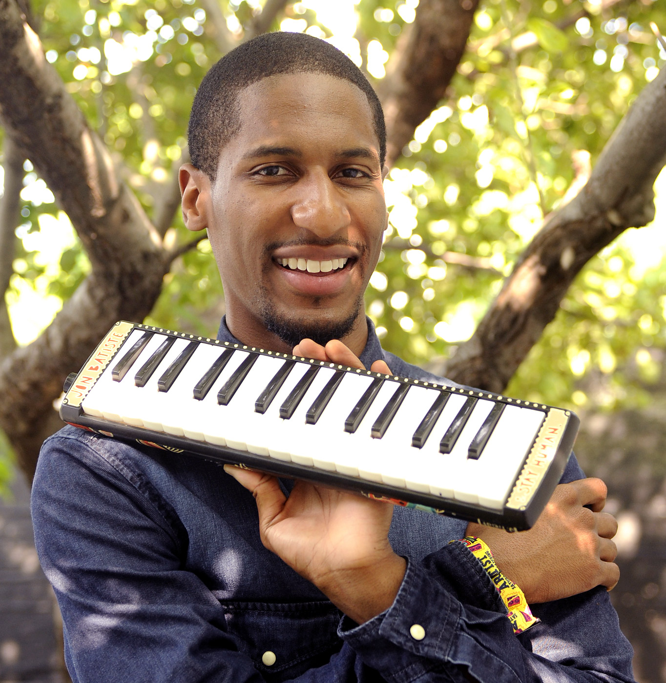 Jon Batiste poses at 2014 Lollapalooza at Grant Park on Aug. 2, 2014 in Chicago. (Tim Mosenfelder—Getty Images)