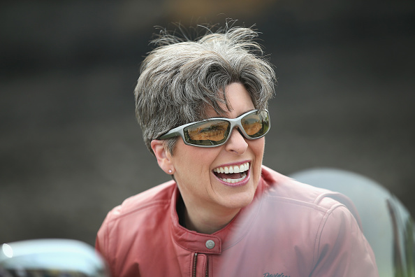 Freshman Senator Joni Ernst (R-IA) arrives at Big Barn Harley-Davidson for the start of her Roast and Ride event on June 6, 2015 in Des Moines, Iowa.