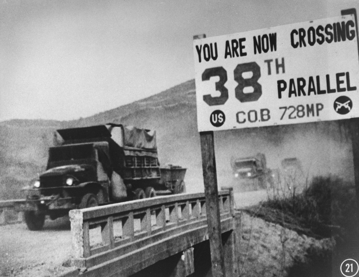 UN forces' transport vehicles recrossing the 38th Parallel as they withdraw from Pyongyang in 1950 (Time Life Pictures—The LIFE Picture Collection/Getty)