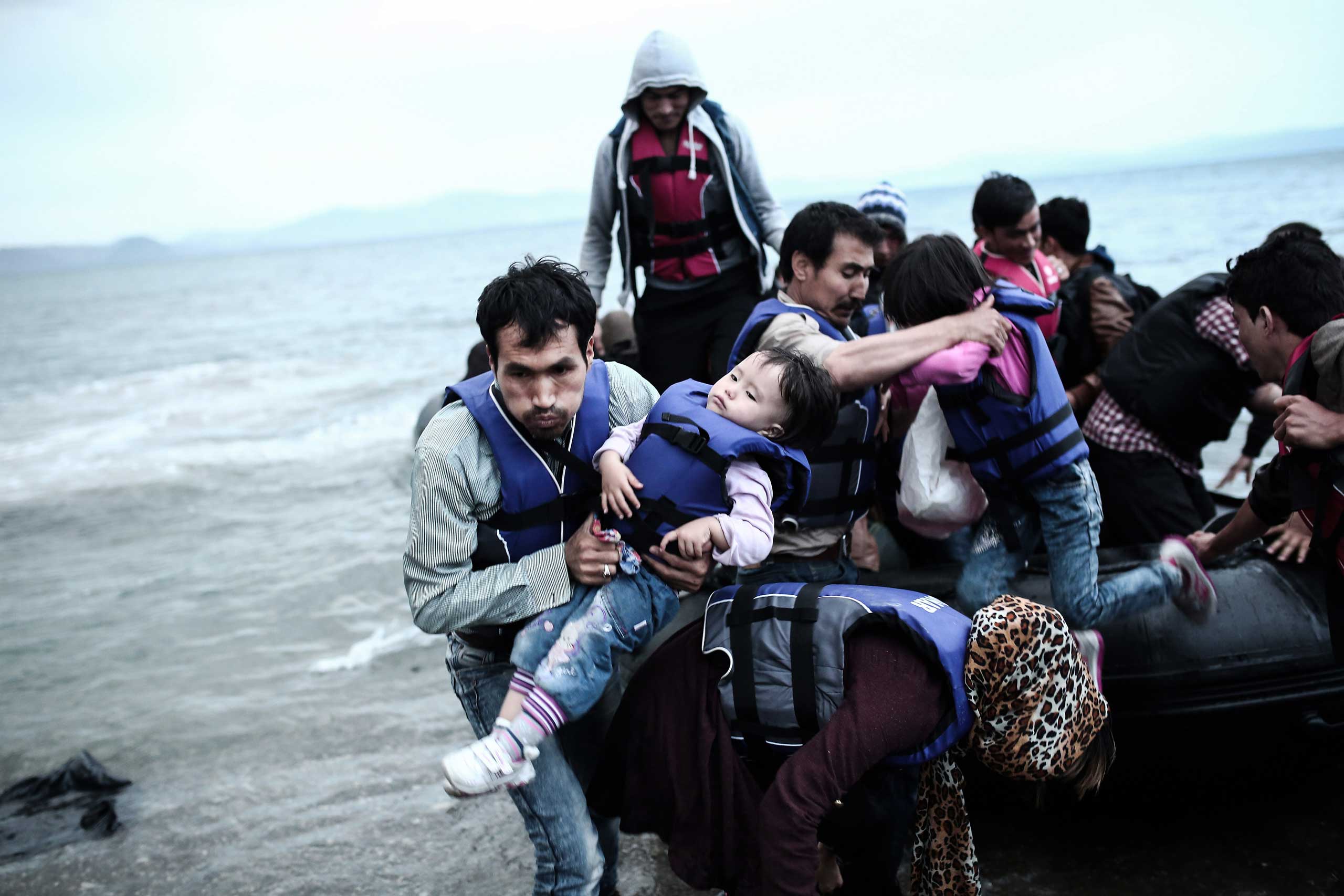 Afghan migrants arrive on the Greek island of Kos, after crossing a part of the Aegean Sea between Turkey and Greece, on May 27, 2015.