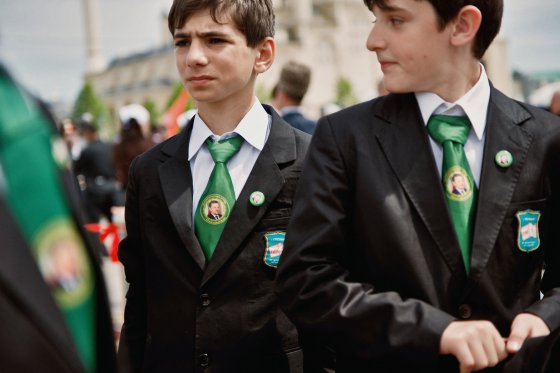 Chechen students wear ties picturing their leader Akhmad Kadyrov, at a WWII Victory Day Parade in Grozny, Chechnya May 2010.Yuri kozyrev—NOOR