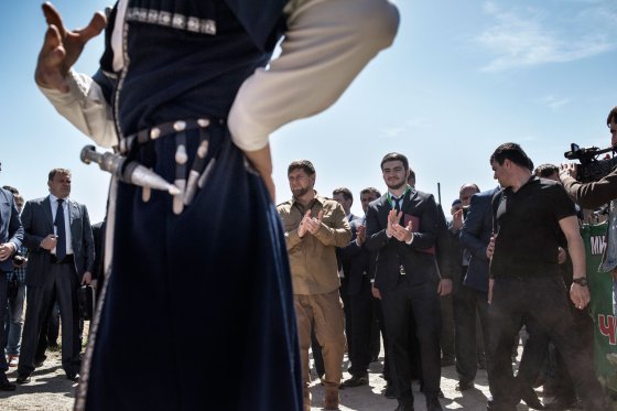 Traditional Chechen folk dancers perform for senior Russian and Chechen officials at a cultural festival near the town of Shali, Chechnya, April 18, 2015. Yuri kozyrev—NOOR for TIME