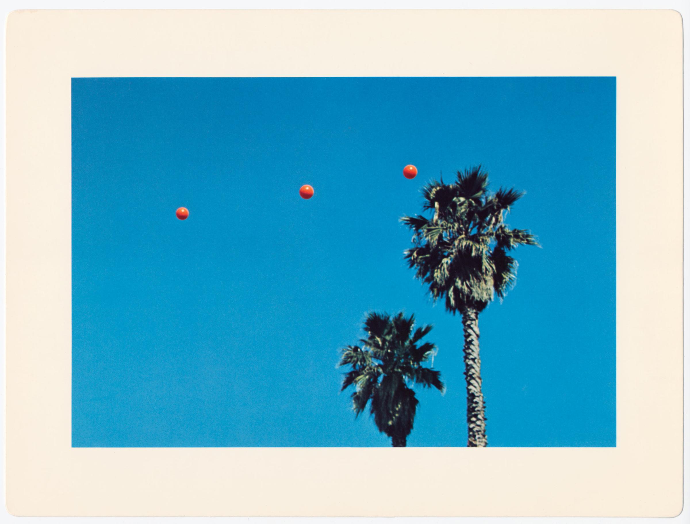 John-Baldesarri--Throwing-Three-balls-Both-Sides-of-Sunset-LA