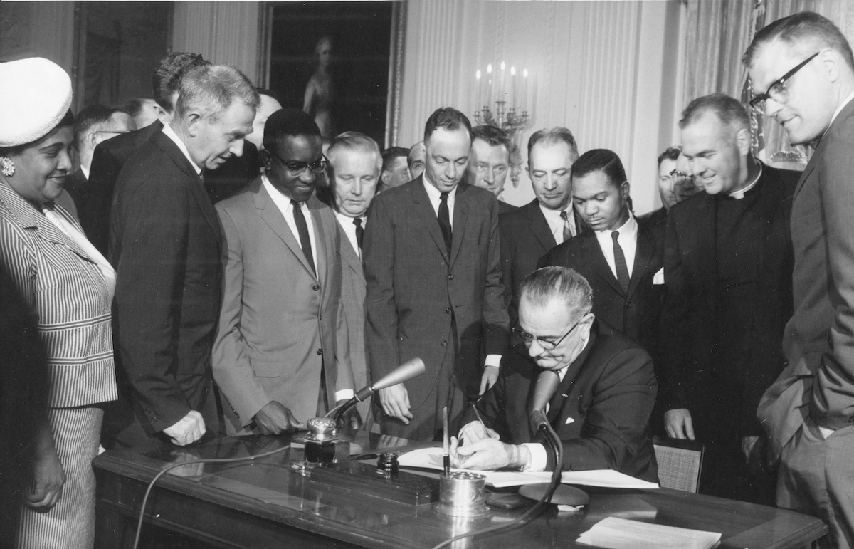 Johnson Signs Civil Rights Act