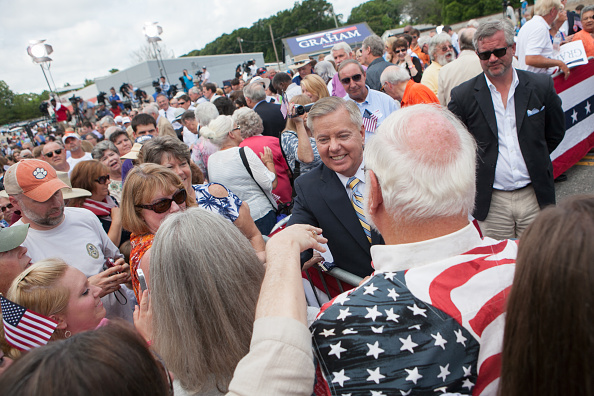 U.S. Sen. Lindsey Graham (R-SC) shakes hands with supporters after announcing his candidacy for United States President during an outdoor event on June 1, 2015 in Central, South Carolina.