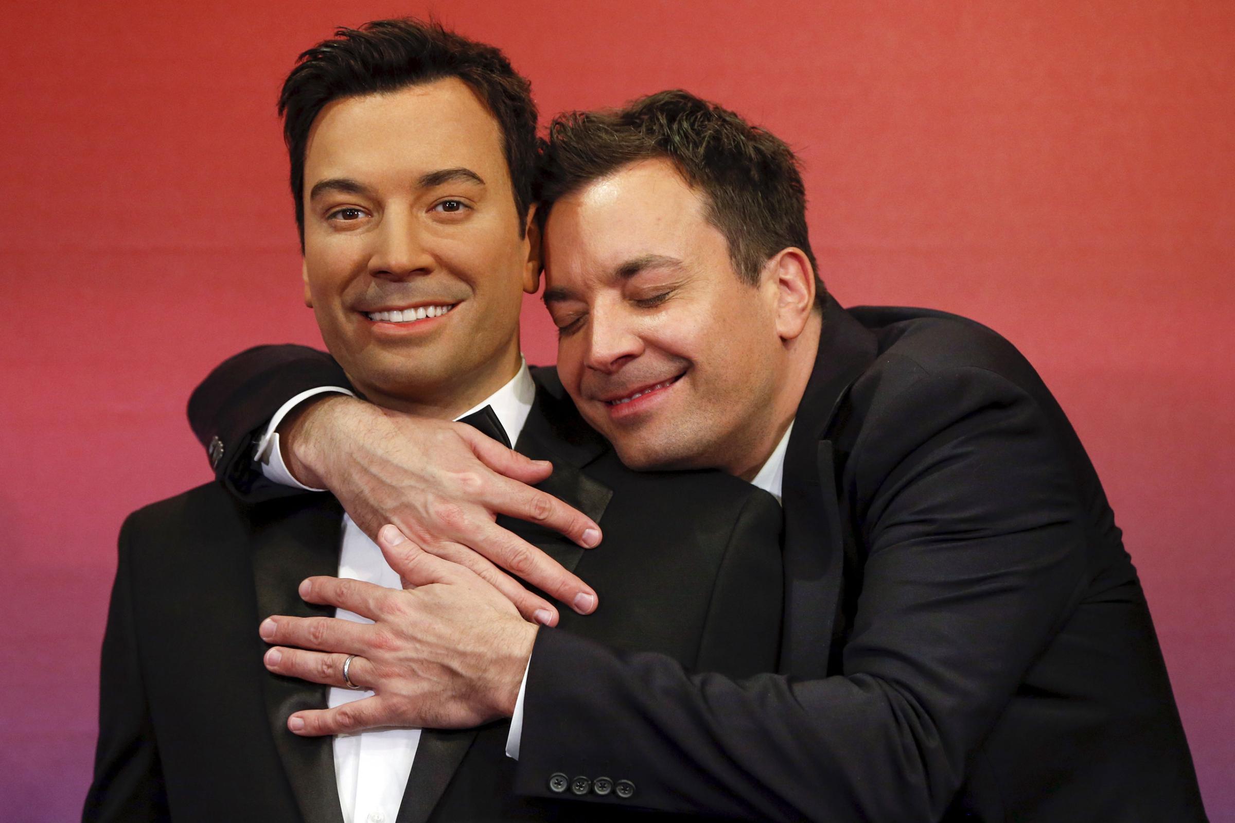TV host Fallon poses with his wax figures at Madame Tussauds museum in the Manhattan borough of New York