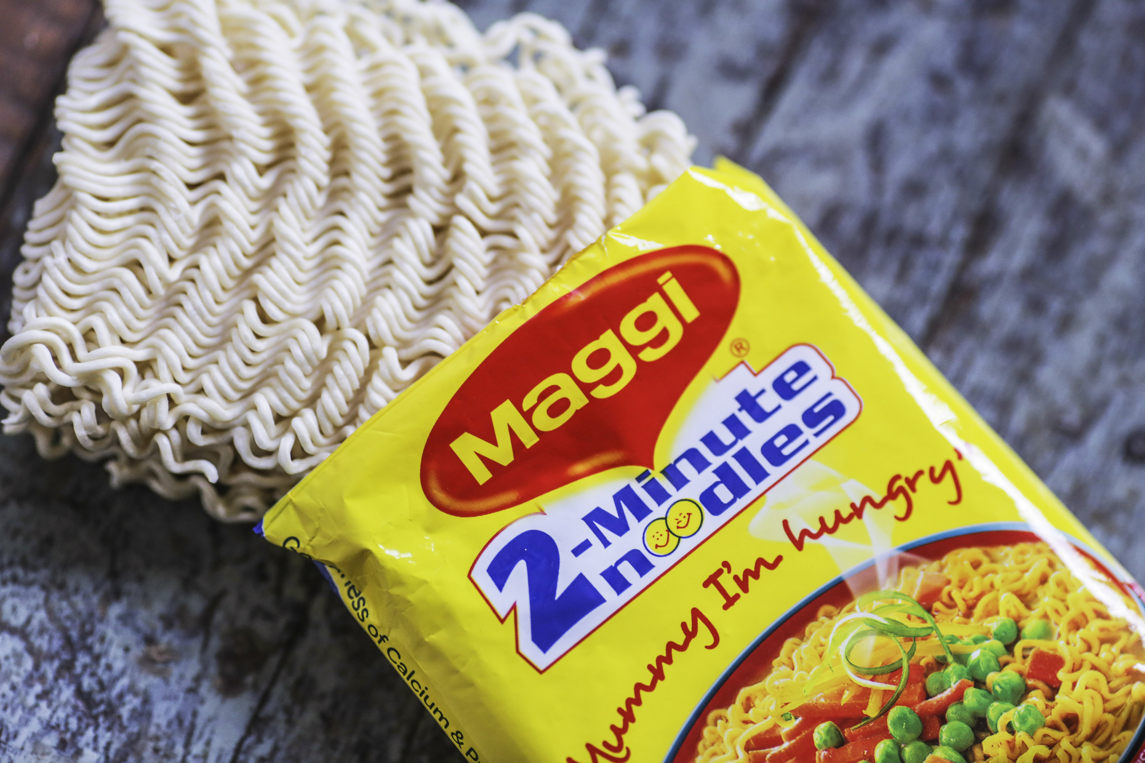 An open packet of Maggi 2-Minute Noodles, manufactured by Nestle India Ltd., are arranged for a photograph inside a general store in Mumbai, on June 2, 2015. (Dhiraj Singh—Bloomberg/Getty Images)
