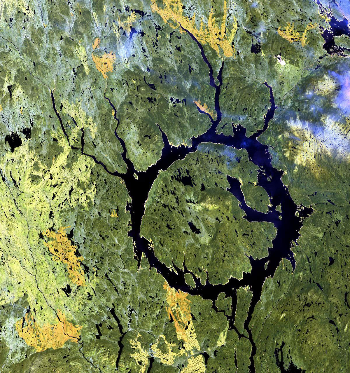 Manicouagan Impact Structure in Quebec. It is roughly 213-215 million years old and has a diameter of approximately 100 km.