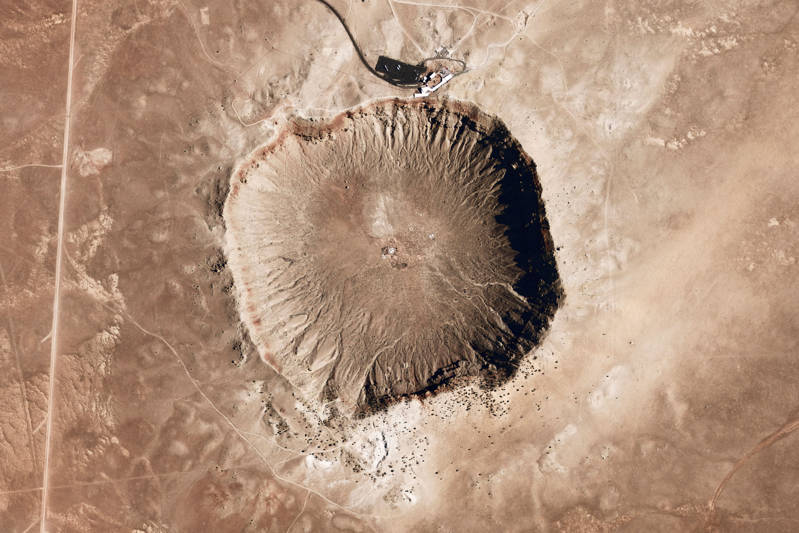Barringer impact structure (also known as Meteor Crater) in Arizona. It is 49,000 years old and has a diameter of 1186 km.