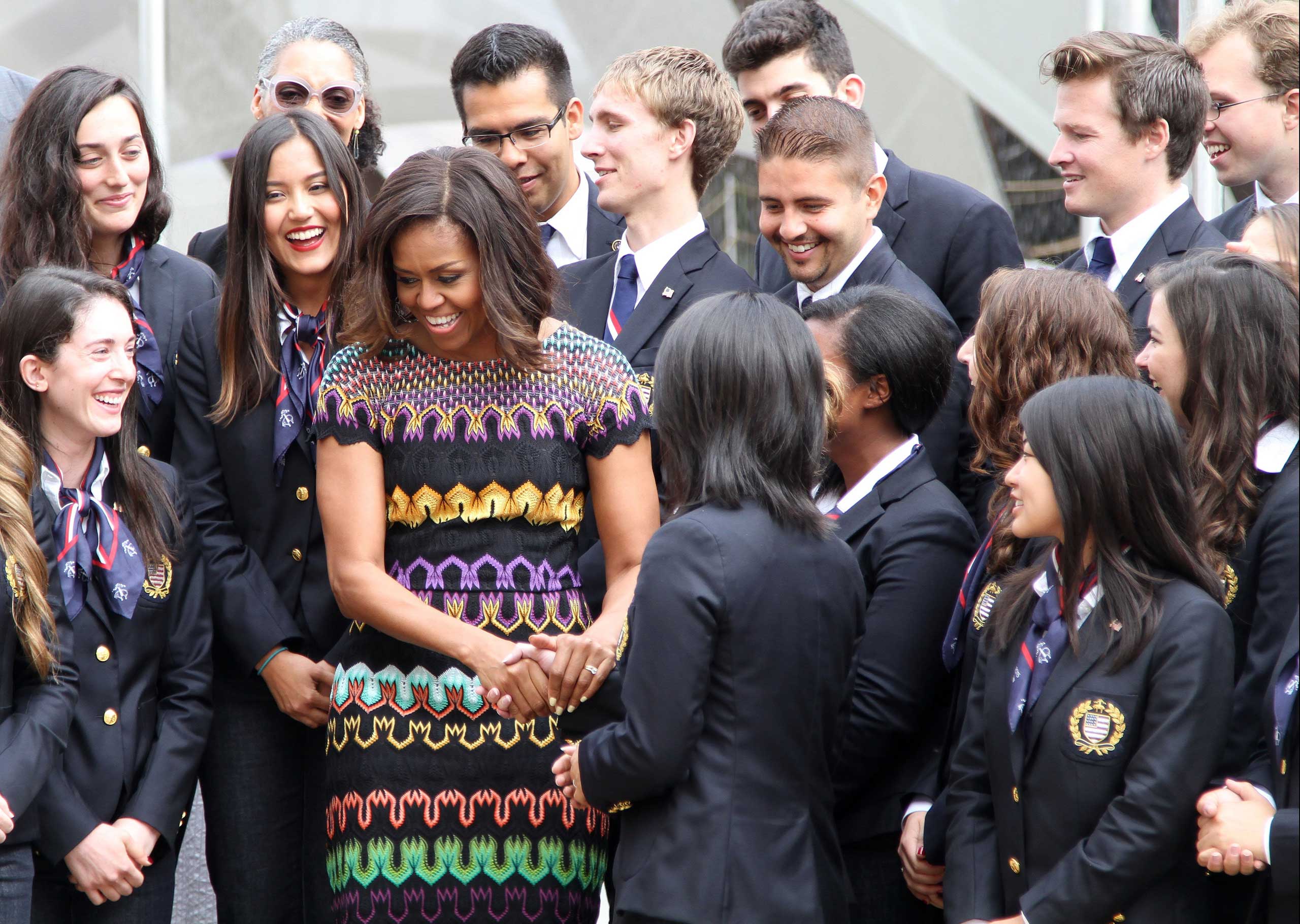 First Lady Michelle Obama speaks with students of the American School at USA Pavilion during the Presidential Delegation at Milan Expo 2015 in Milan on June 18, 2015.
