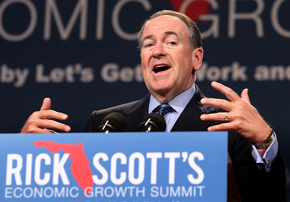 GOP presidential contender Mike Huckabee delivers a defense of Social Security benefits during Florida Gov. Rick Scott's Economic Growth Summit on Tuesday, June 2, 2015, at the Yacht & Beach Club Convention Center at Walt Disney World in Lake Buena Vista, Fla.