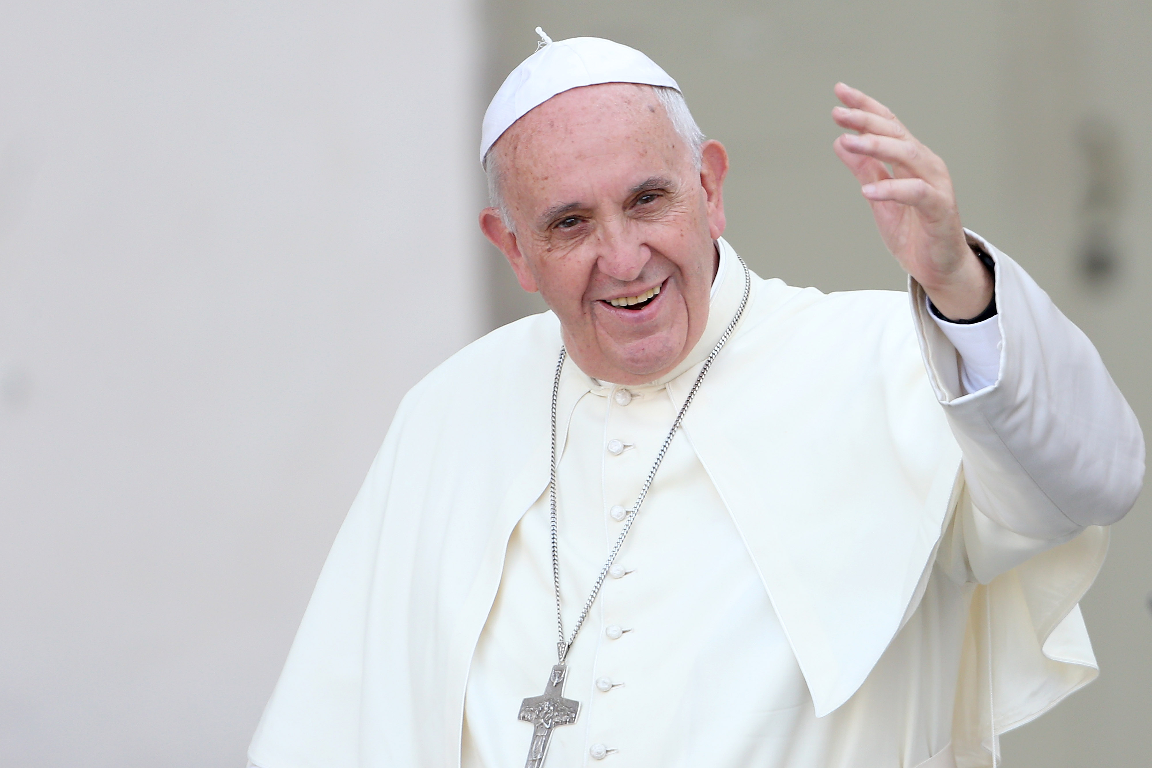 Pope Francis waves to the faithful as he arrives in St. Peter's Square for a meeting with the Roman Diocesans on June 14, 2015 in Vatican City. (Franco Origlia—Getty Images)