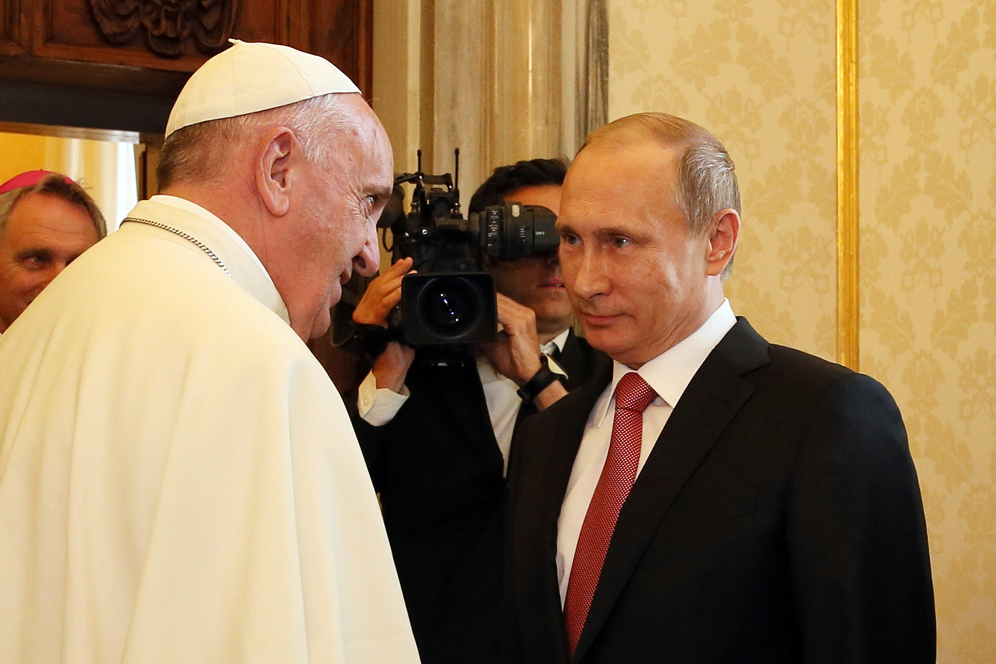 Pope Francis meets President of Russian Federation Vladimir Putin during an audience at the Apostolic Palace on June 10, 2015 in Vatican City, Vatican. (Vatican Pool—Getty Images)