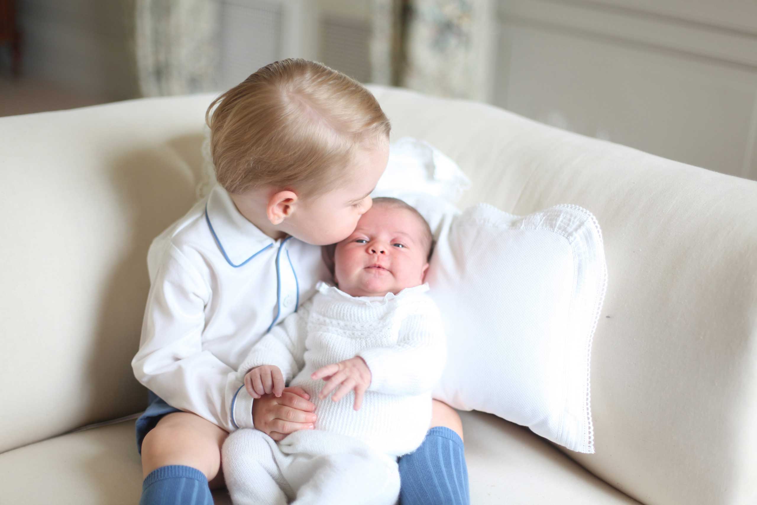 Prince George and his sister Princess Charlotte at Anmer Hall in Norfolk, Britain, mid-May 2015.
