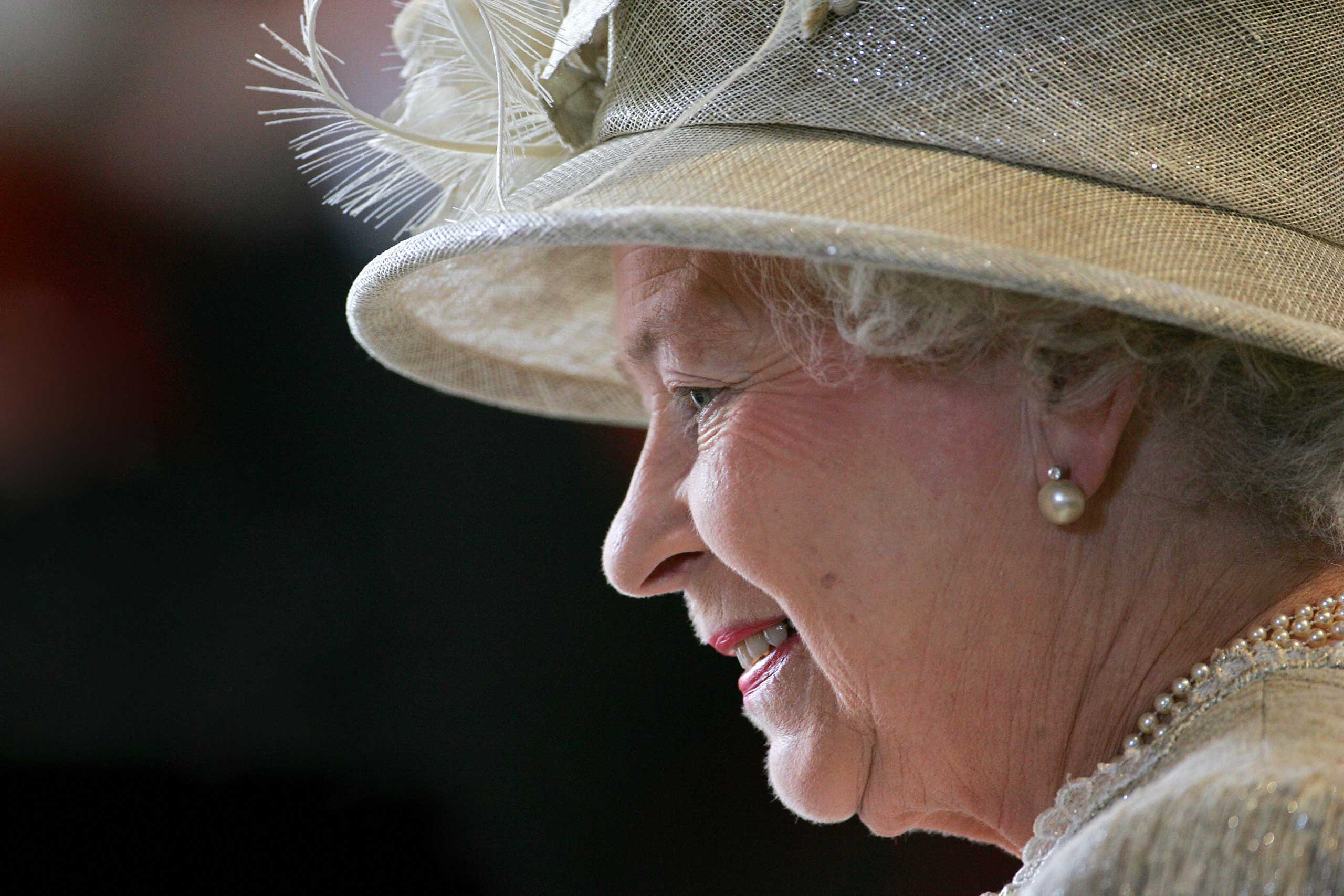 Queen Elizabeth II leaves St Paul's Cathedral in London after a service of thanksgiving in honor of  her official 80th birthday in June 2006. (John D McHugh—AFP/Getty Images)