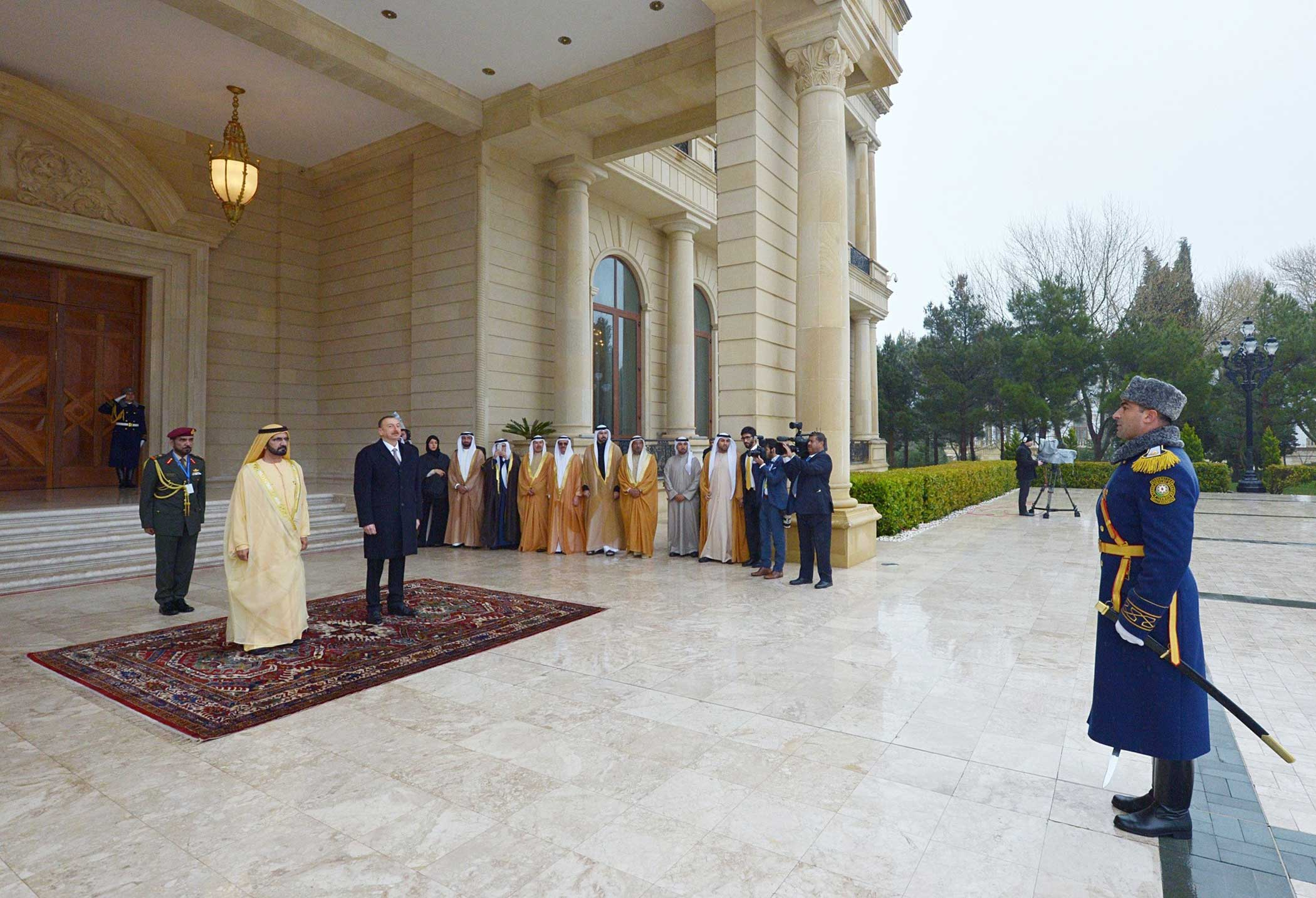 Vice President and Prime Minister of the United Arab Emirates (UAE) Mohammed bin Rashid Al Maktoum (L) is seen next to Azerbaijani President Ilham Aliyev (L 2) during his official visit in Baku, Azerbaijan on April 2, 2015.