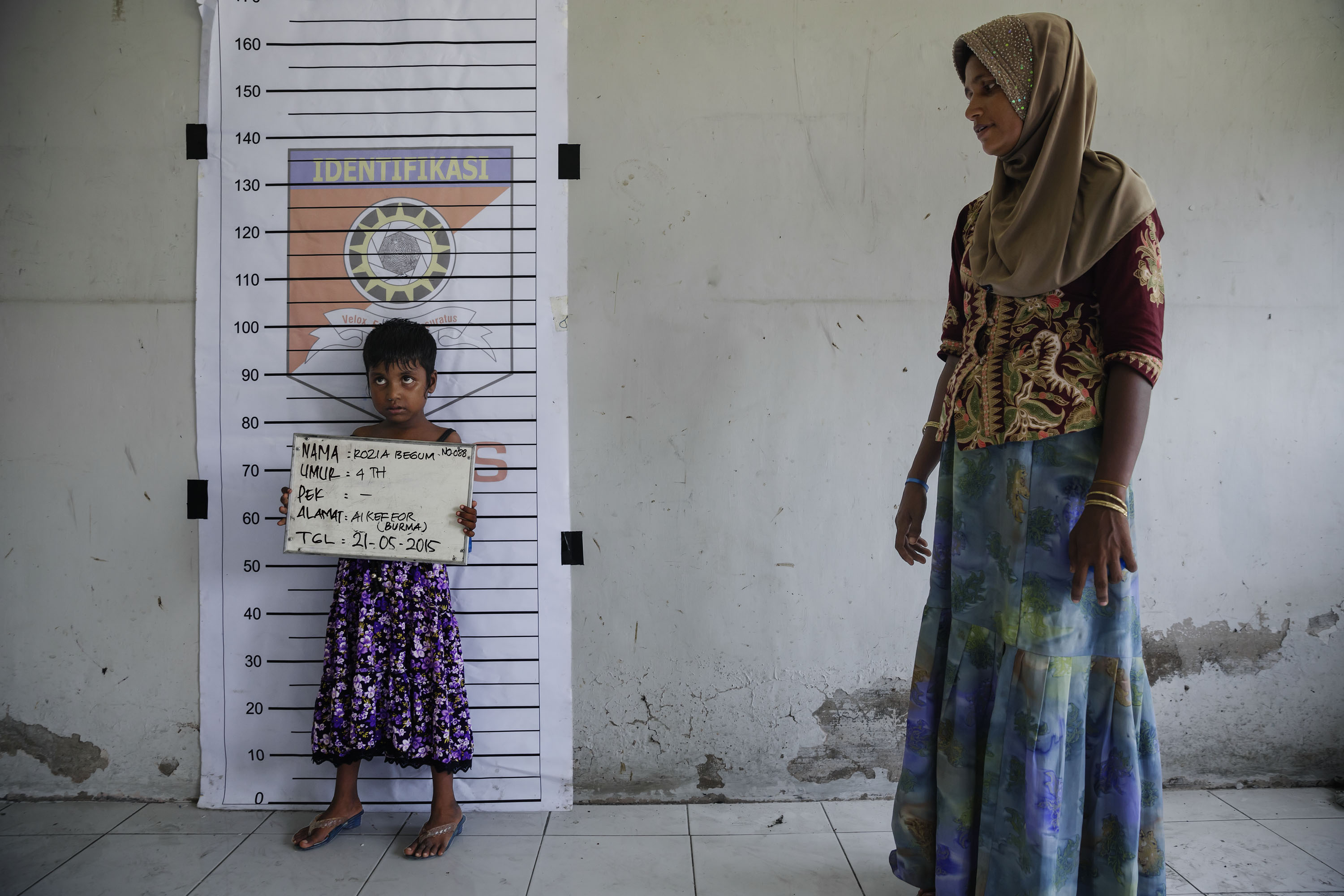 A Rohingya child is registered at a temporary shelter in Indonesia in May. (James Nachtwey for TIME)