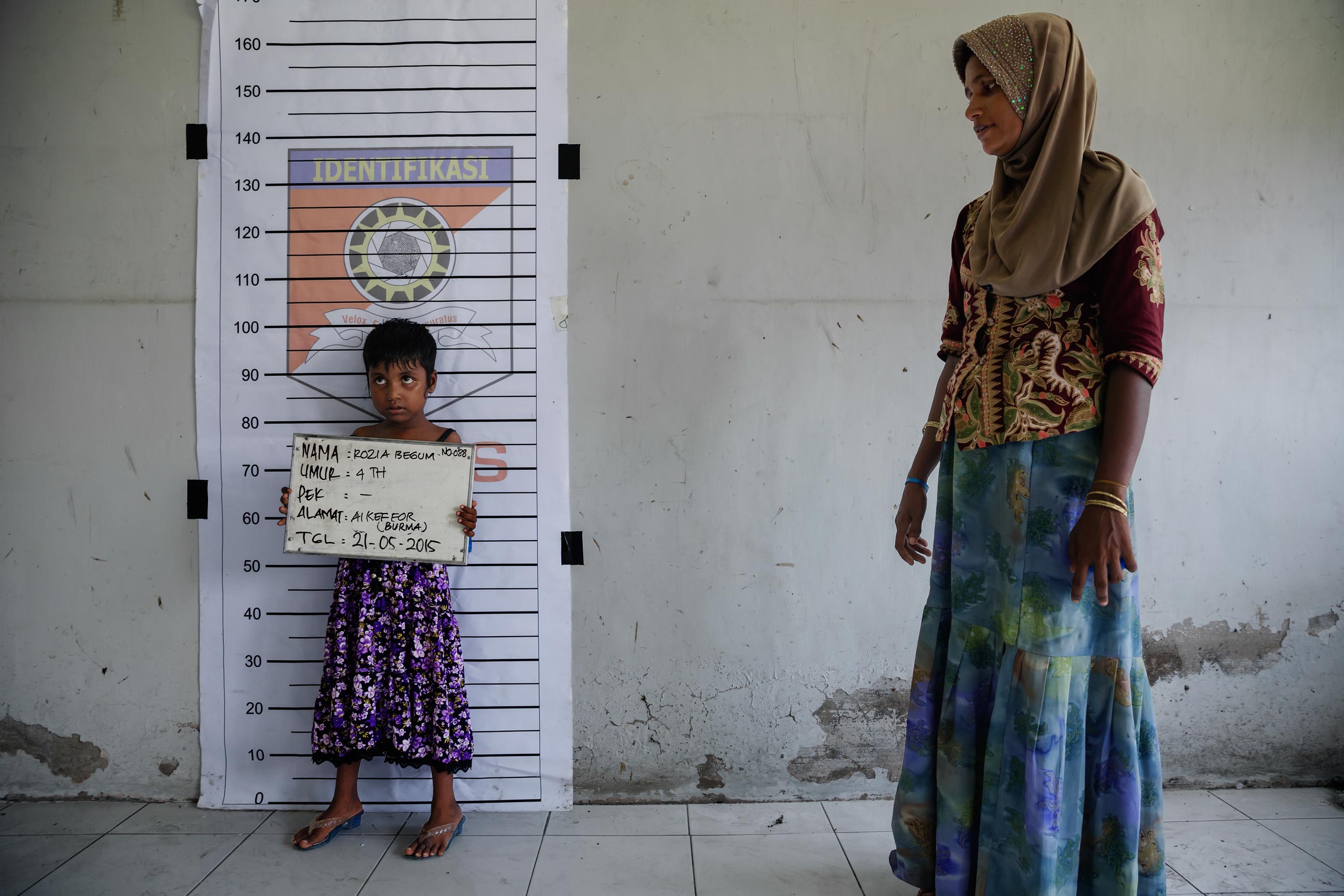 A Rohingya child is registered at a temporary shelter in Indonesia. (James Nachtwey for TIME)