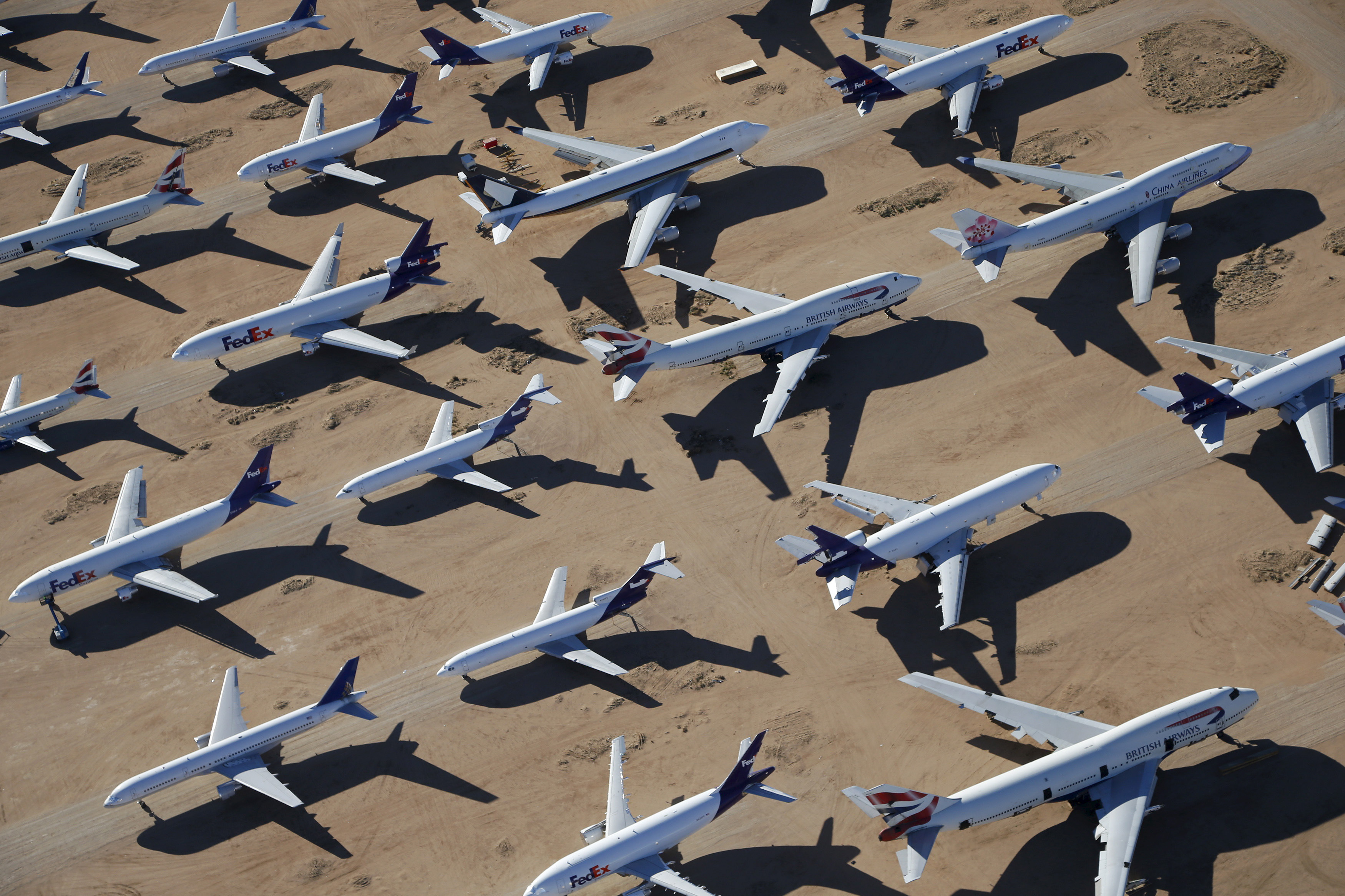 Old airplanes are stored in the desert in Victorville