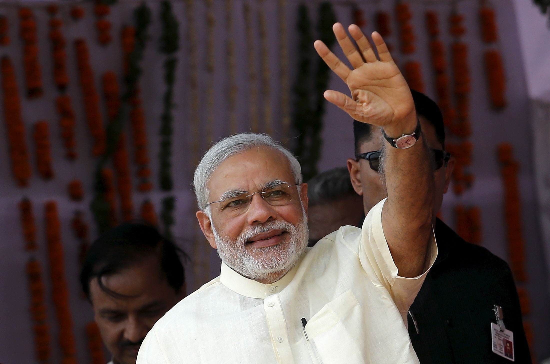 India's Prime Minister Narendra Modi waves towards his supporters during a rally in Mathura, India, May 25, 2015. (Adnan Abidi—Reuters)