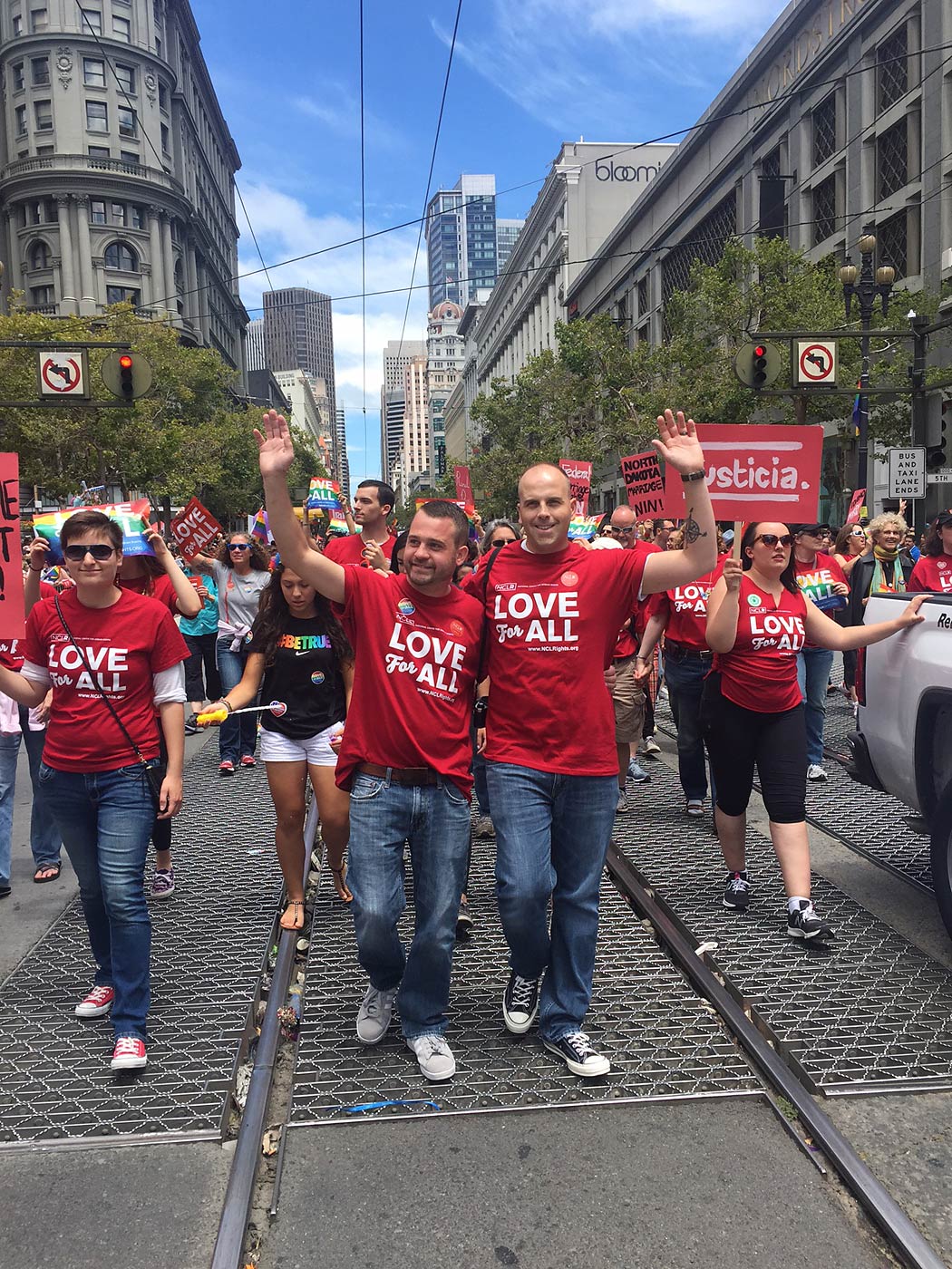 Plaintiffs Thom Kostura (left) and his husband Ijpe DeKoe (right) march in the gay pride parade in San Francisco on June 28, 2015. (Courtesy Thom Kostura)