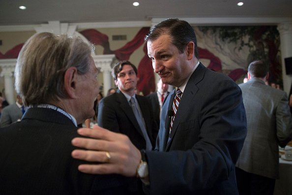 Senator Ted Cruz, a Republican from Texas and 2016 presidential candidate, right, greets an attendee after speaking at the Faith and Freedom Coalition's "Road to Majority" legislative luncheon in Washington, D.C., on Thursday, June 18, 2015.