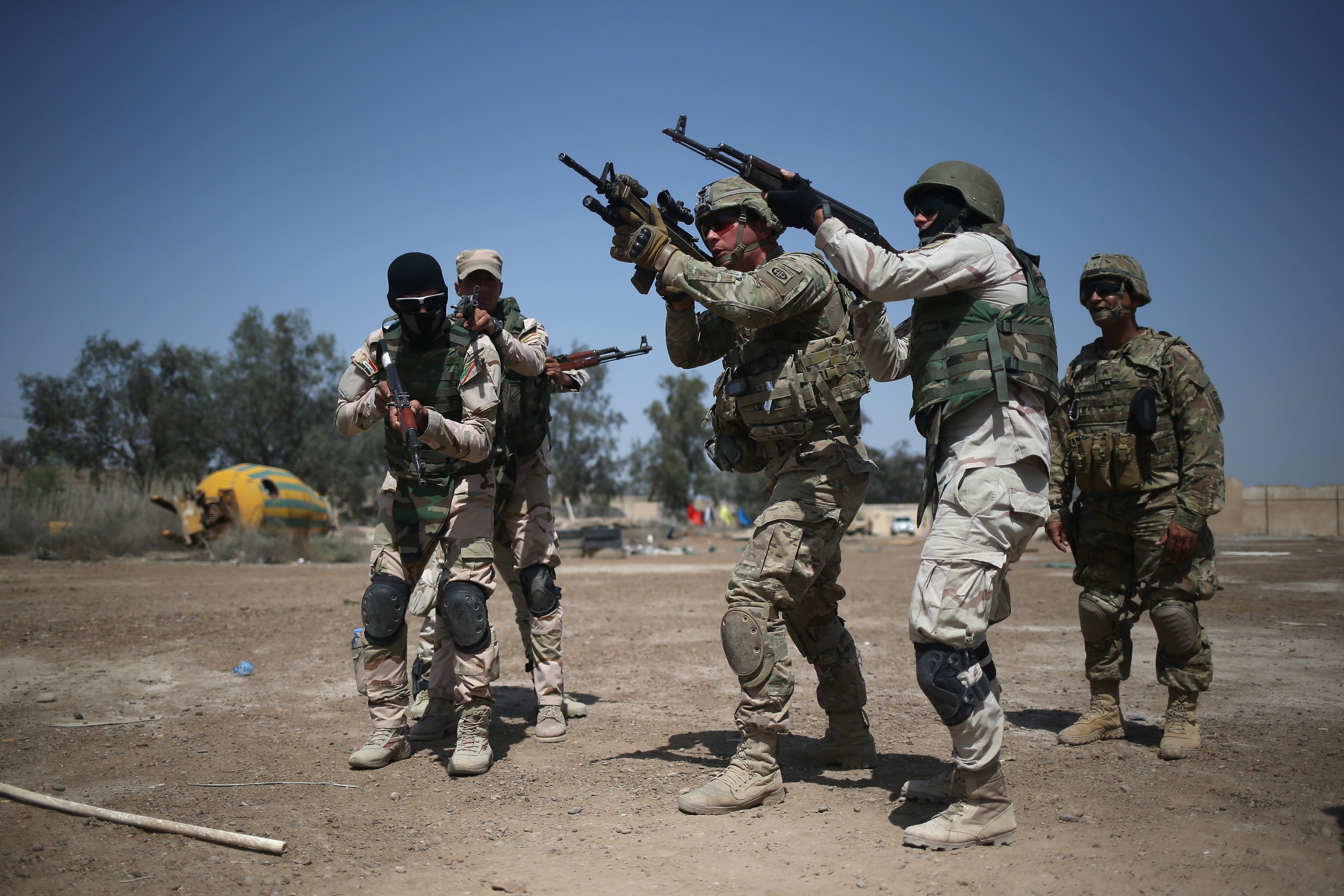 U.S. Army trainers instruct Iraqi Army recruits at a military base on April 12, 2015 in Taji, Iraq.