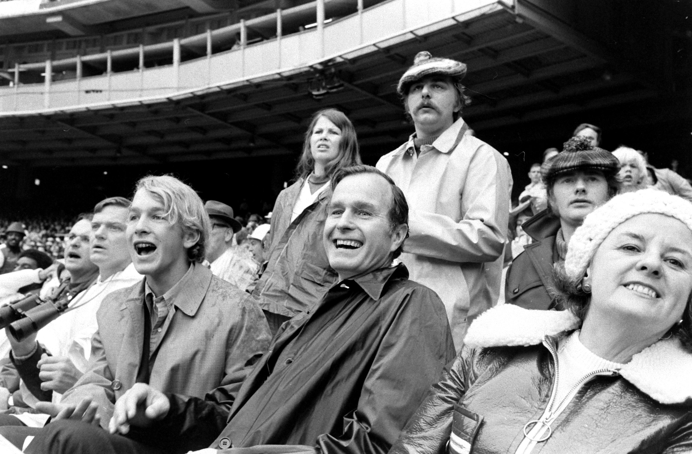 George H.W. Bush at a baseball game with son Marvin in 1971.