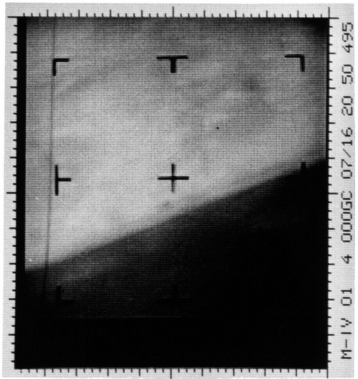 An enhanced contrast version of the first Mars photograph released on July 15, 1965 (NASA/JPL)