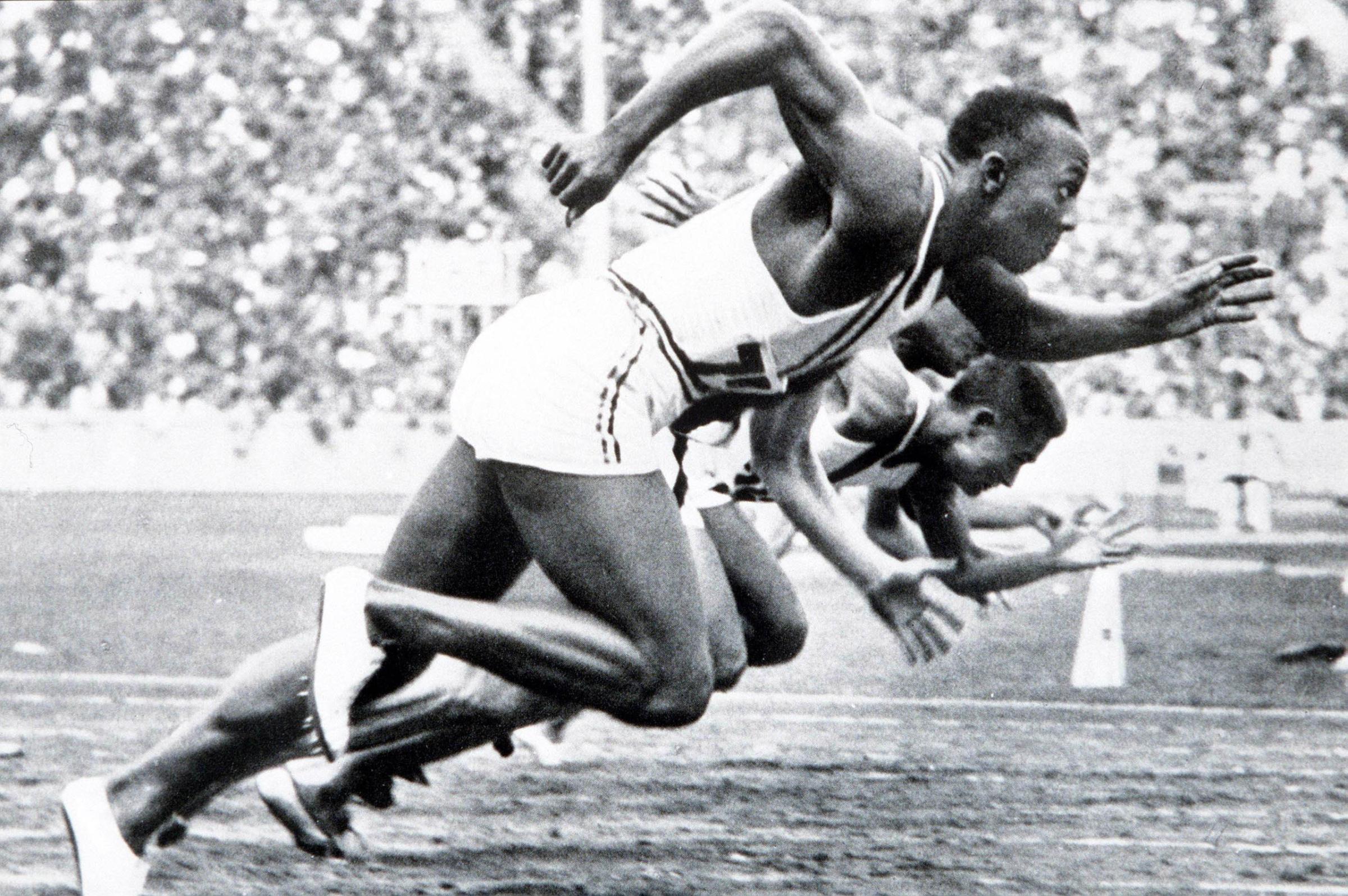 1936 Olympic Games, Berlin, Germany, Men's 100 Metres Final, USA's legendary Jesse Owens on his way to winning one of his four gold medals.