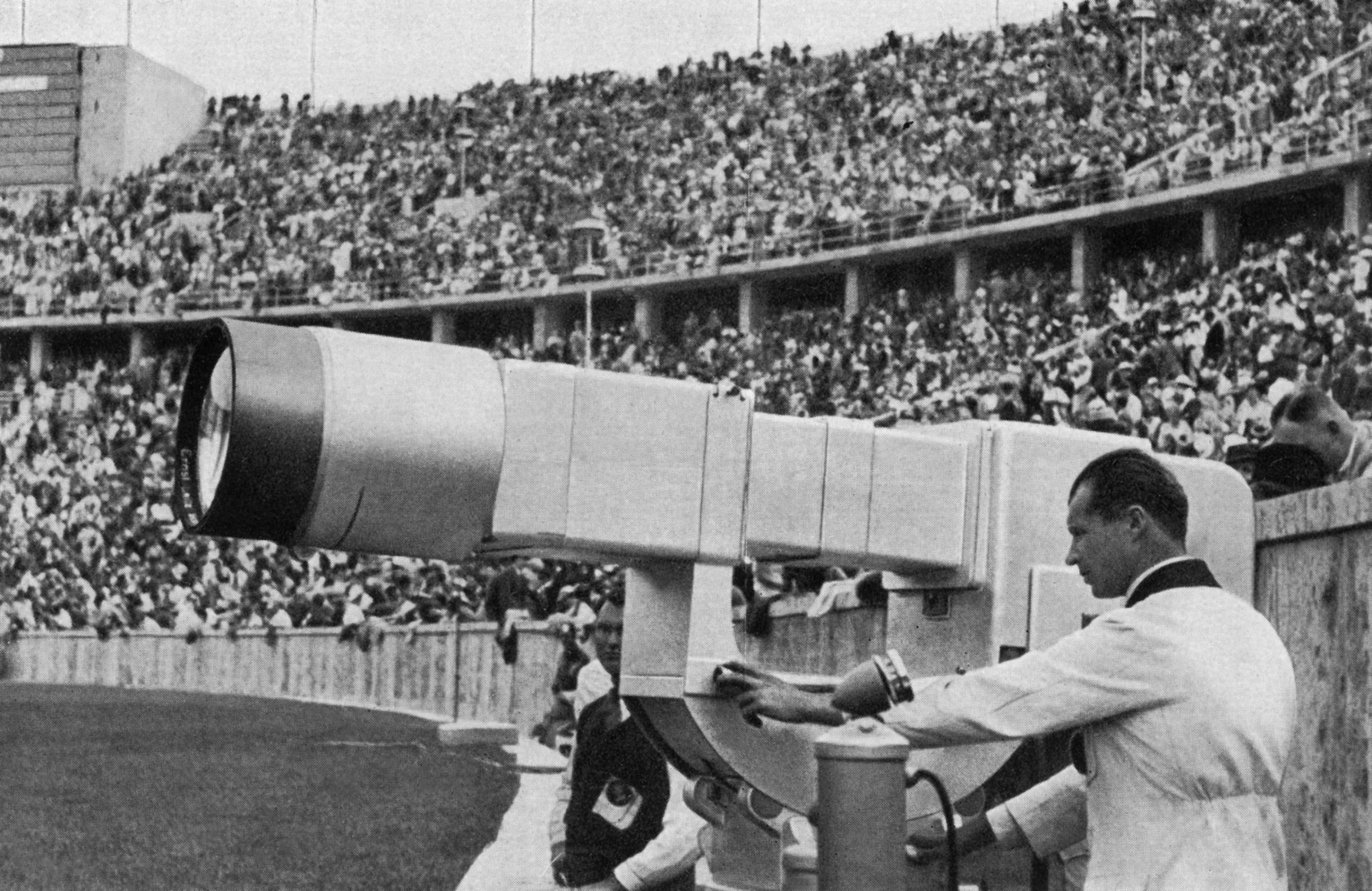 A German technician checks the Television canon put in the Olympic Stadium, 01 August 1936, a huge electronic camera buildt by Telefunken, which broadcast live for the first time, 8 hours each day, the Berlin Olympics Games show.