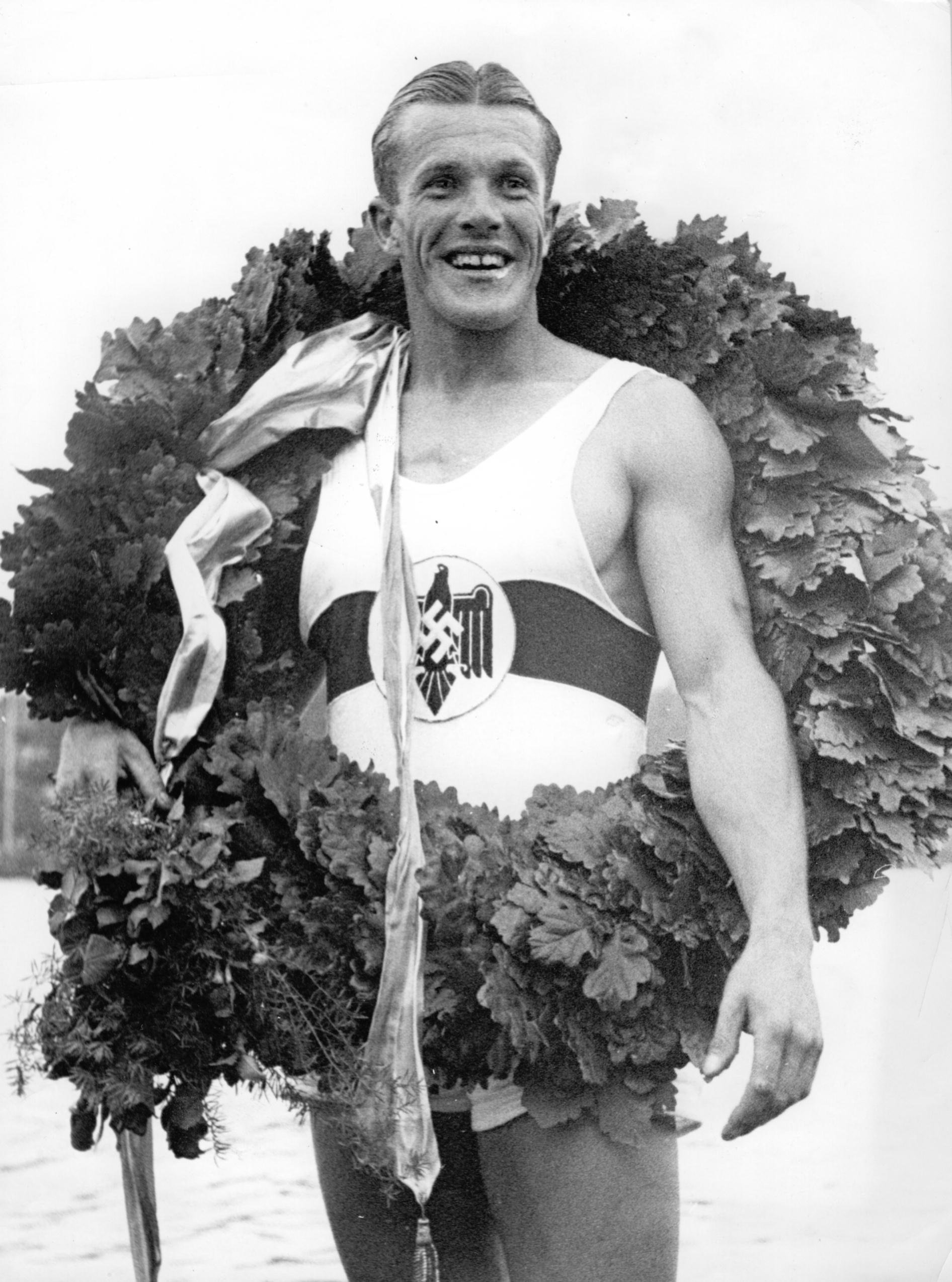 Olympic winner Gustav 'Gummi' Schaefer, German rower, with the laurel wreath during the Summer Olympics in Berlin-Grünau in August 1936.