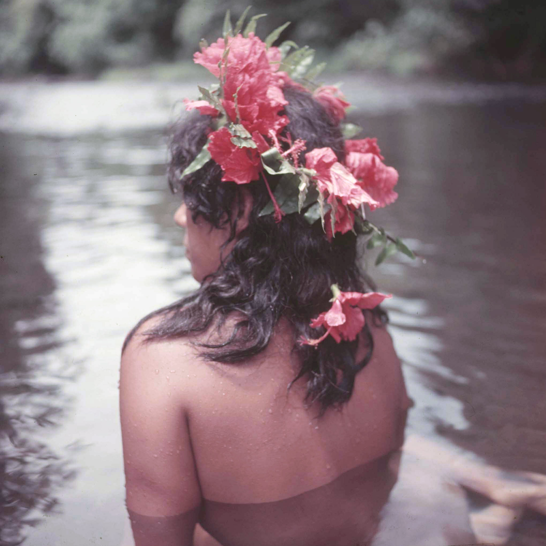 Tahitian girl bathing.