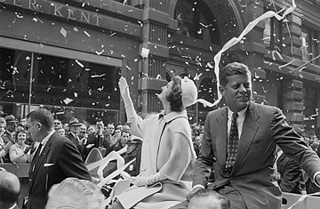 Presidential candidate John F. Kennedy rides on a car with wife Jackie in a ticker-tape parade, Oct. 19, 1960 (Bettmann / CORBIS)