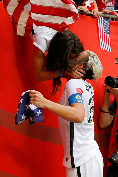 U.S. soccer player Abby Wambach embraces her wife Sarah Huffman at FIFA Women's World Cup final at BC Place Stadium, Vancouver, on July 5, 2015 (Kevin C. Cox—Getty Images)