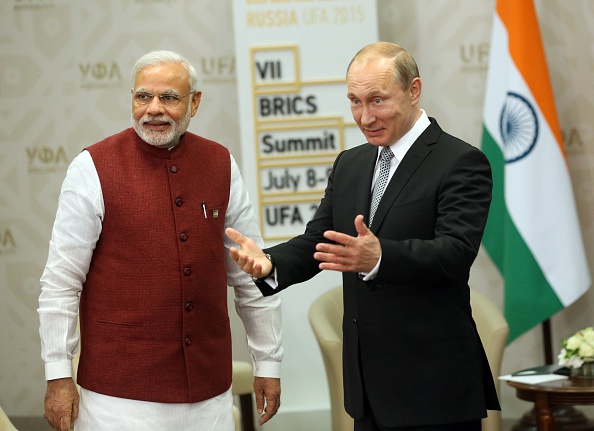 Russian President Vladimir Putin, right, greets Indian Prime Minister Narendra Modi, left, during their bilateral meeting at the BRICS 2015 Summit on July 8, 2015 in Ufa, Russia (Sasha Mordovets—Getty Images)