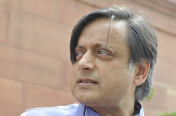 MP Shashi Tharoor attends the monsoon session at Parliament House in New Delhi on July 22, 2015 (Sonu Mehta—Hindustan Times/Getty Images)
