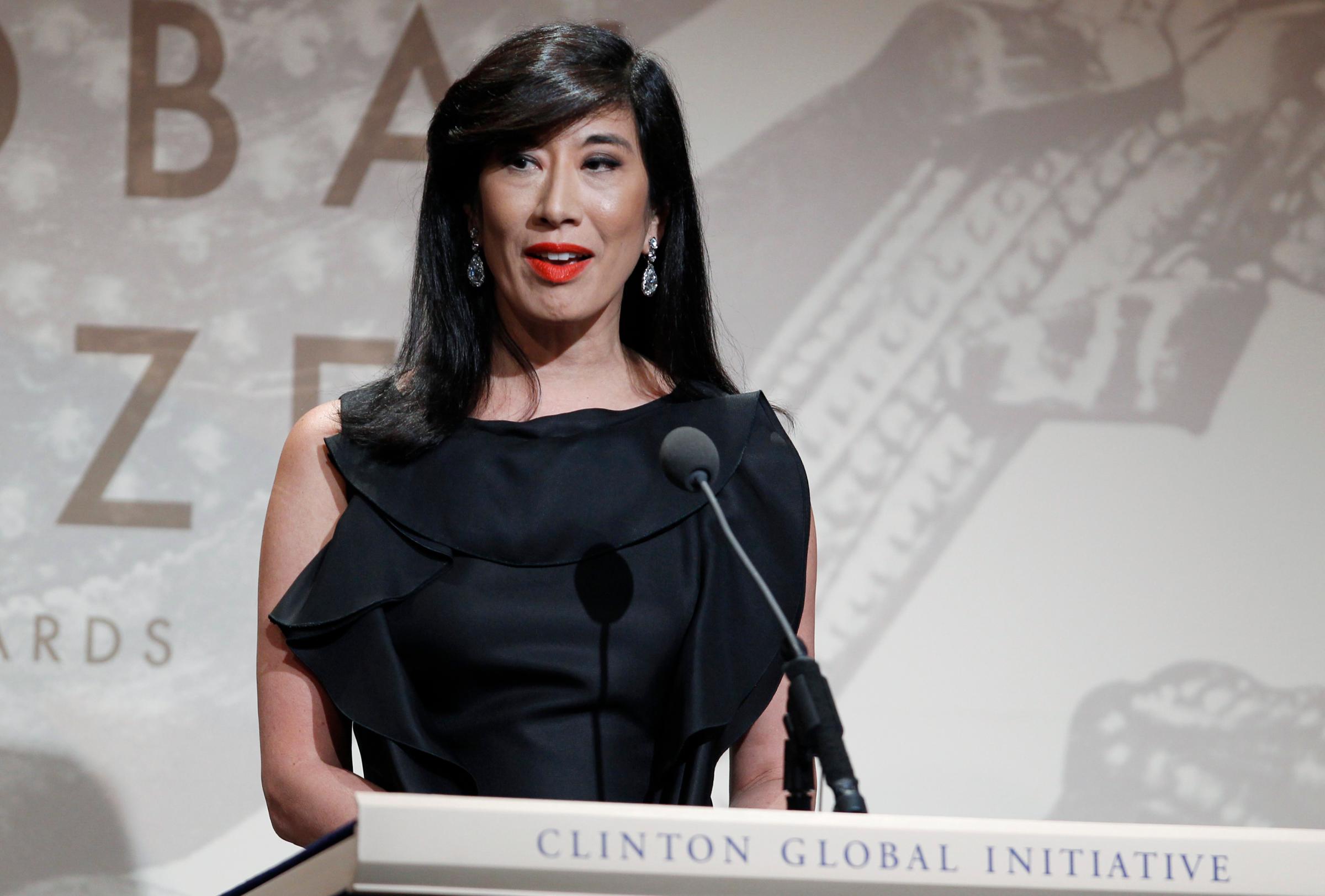 Andrea Jung, CEO of Avon Products Inc., accepts the Leadership in the Corporate Sector award during the Clinton Global Citizen Award ceremony marking the culmination of the Clinton Global Initiative in New York