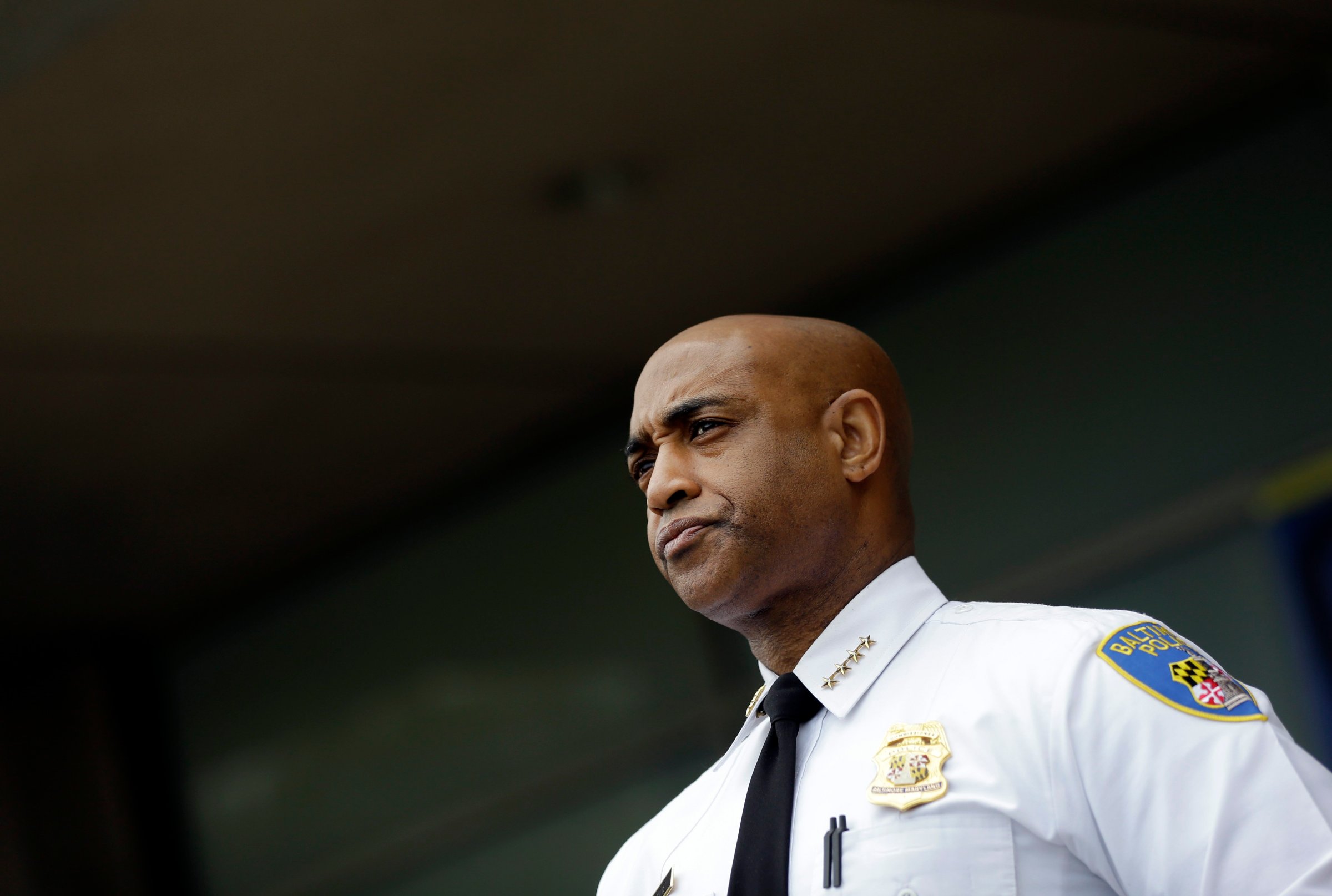 Baltimore Police Department Commissioner Anthony Batts listens as Deputy Commissioner Kevin Davis speaks at a news conference, in Baltimore on April 30, 2015.