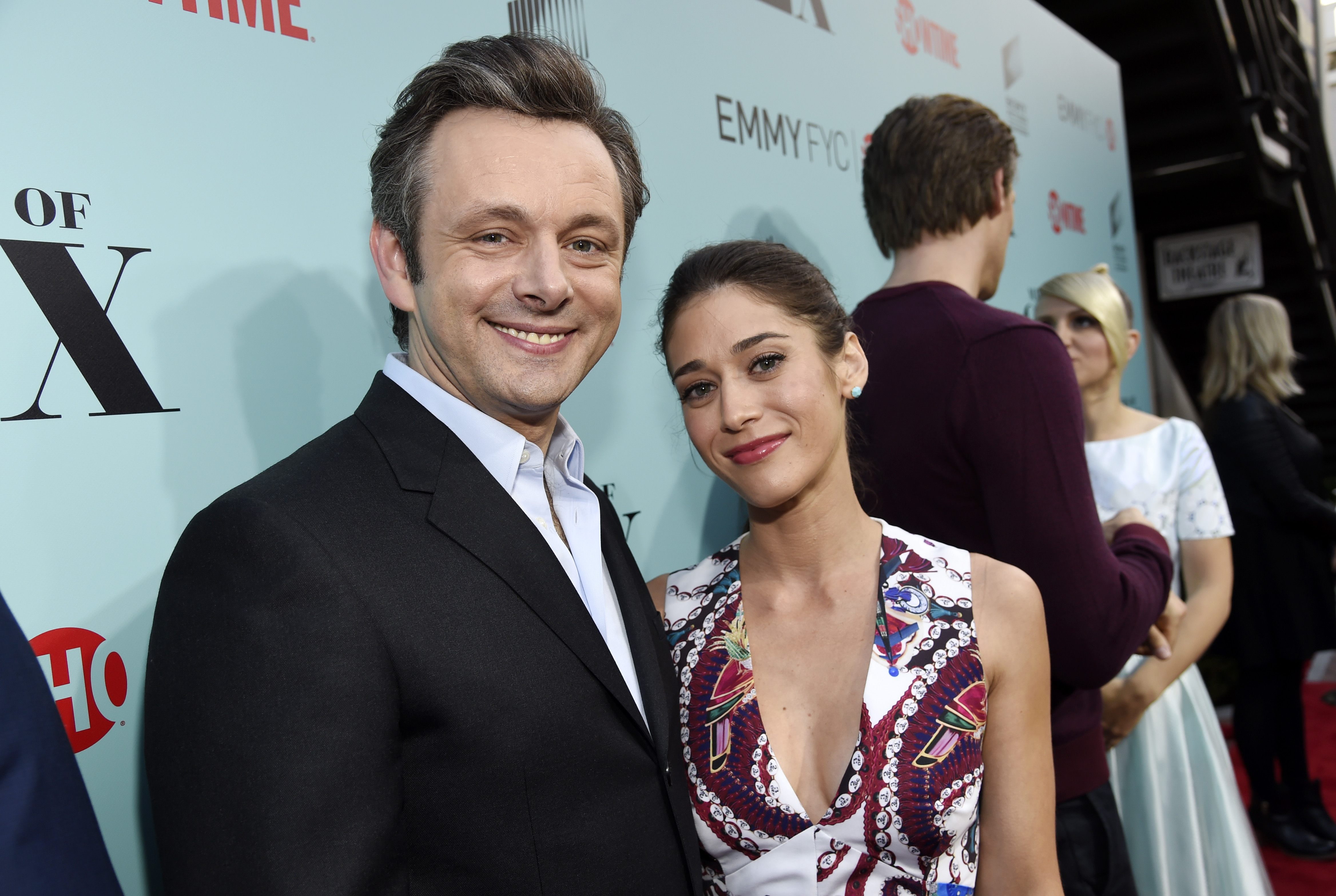 Michael Sheen, left, and Lizzy Caplan, cast members in the Showtime series "Masters of Sex," pose together at a screening and panel discussion for the show at Sony Pictures Studios on Tuesday, May 5, 2015, in Culver City, Calif. (Chris Pizzello–AP)
