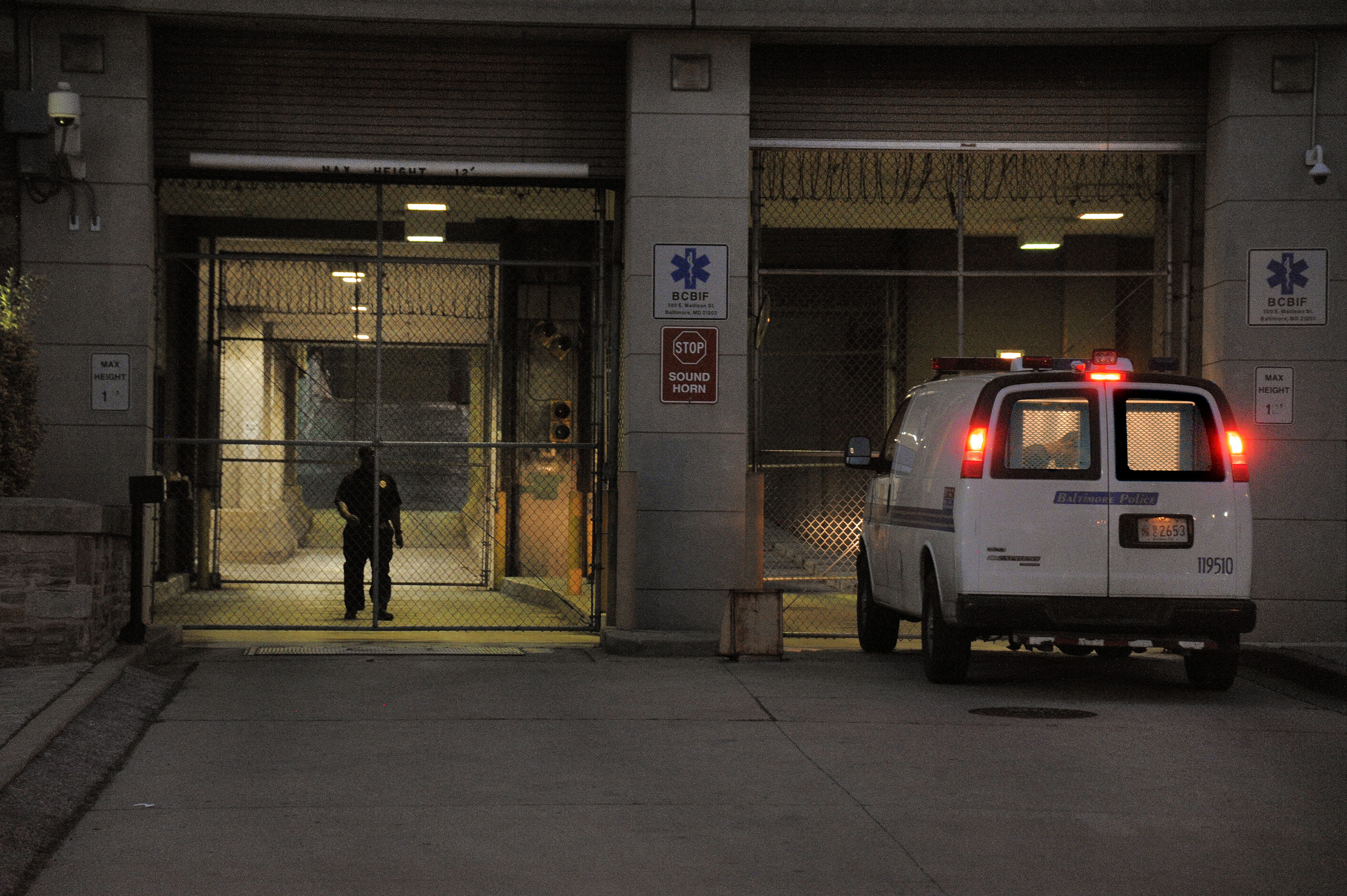 A Baltimore Police transfer van pulls into the Baltimore Central Booking and Intake Center on May 7, 2015. (Karl Merton Ferron—Baltimore Sun/TNS/Getty Images)