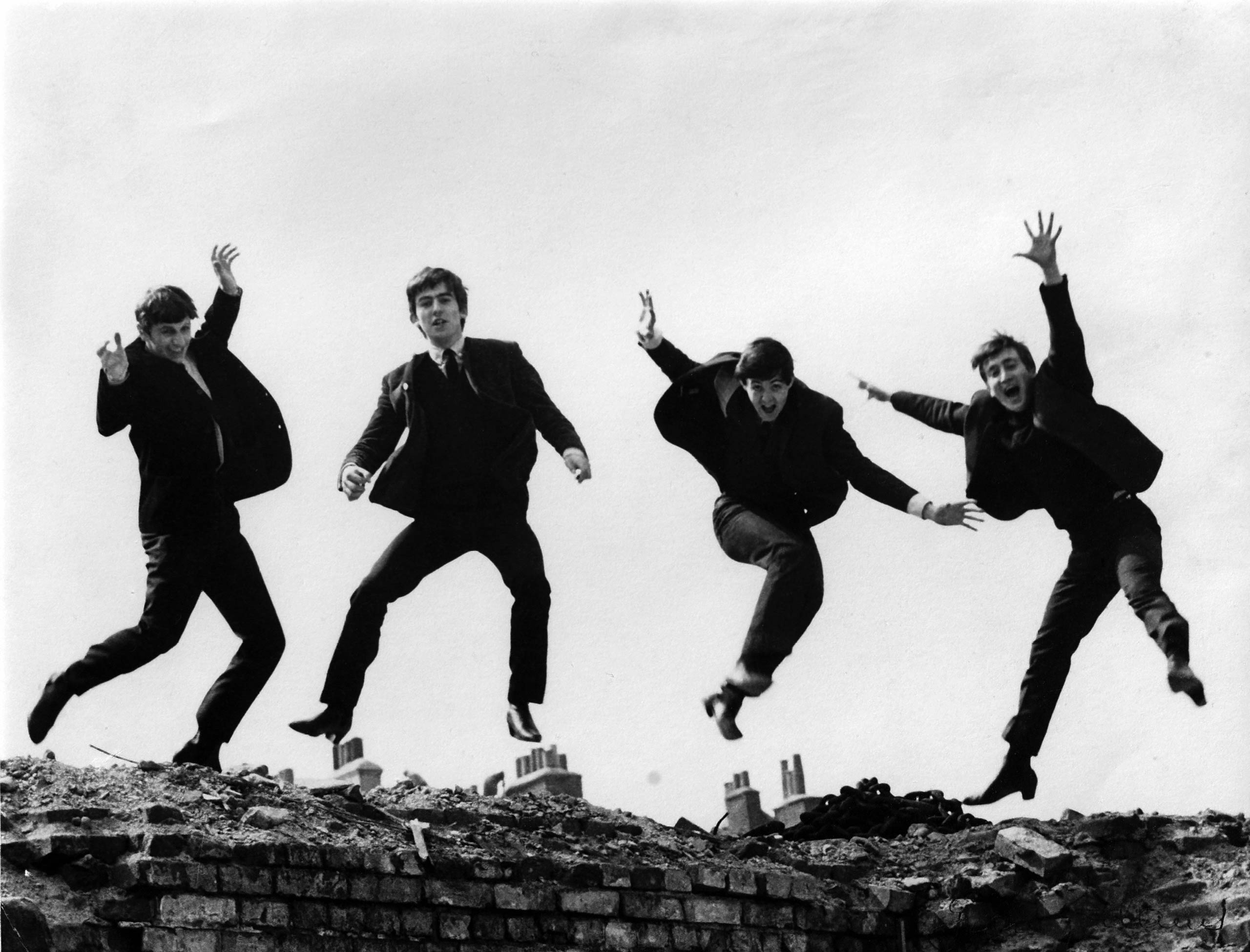 The Beatles jump during a photoshoot for their Twist &amp; Shout EP cover.