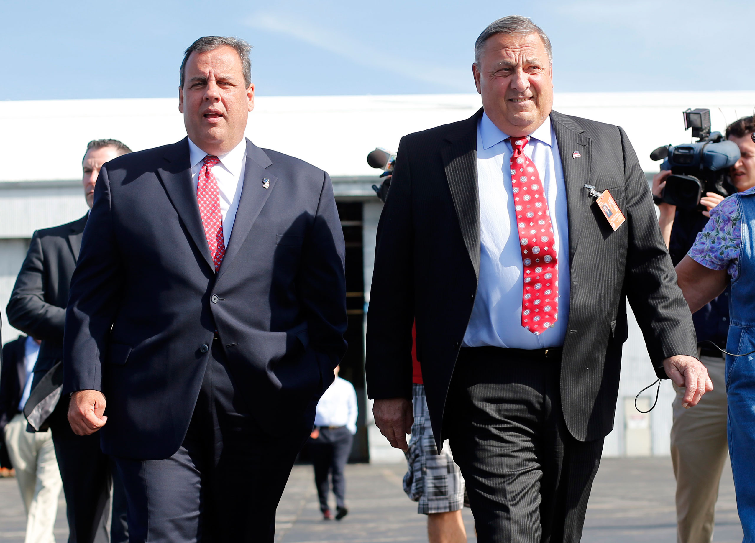 New Jersey Gov. Chris Christie, left, and Maine Gov. Paul LePage in Bangor, Maine, on, Aug. 12, 2014. (Robert F. Bukaty—AP)