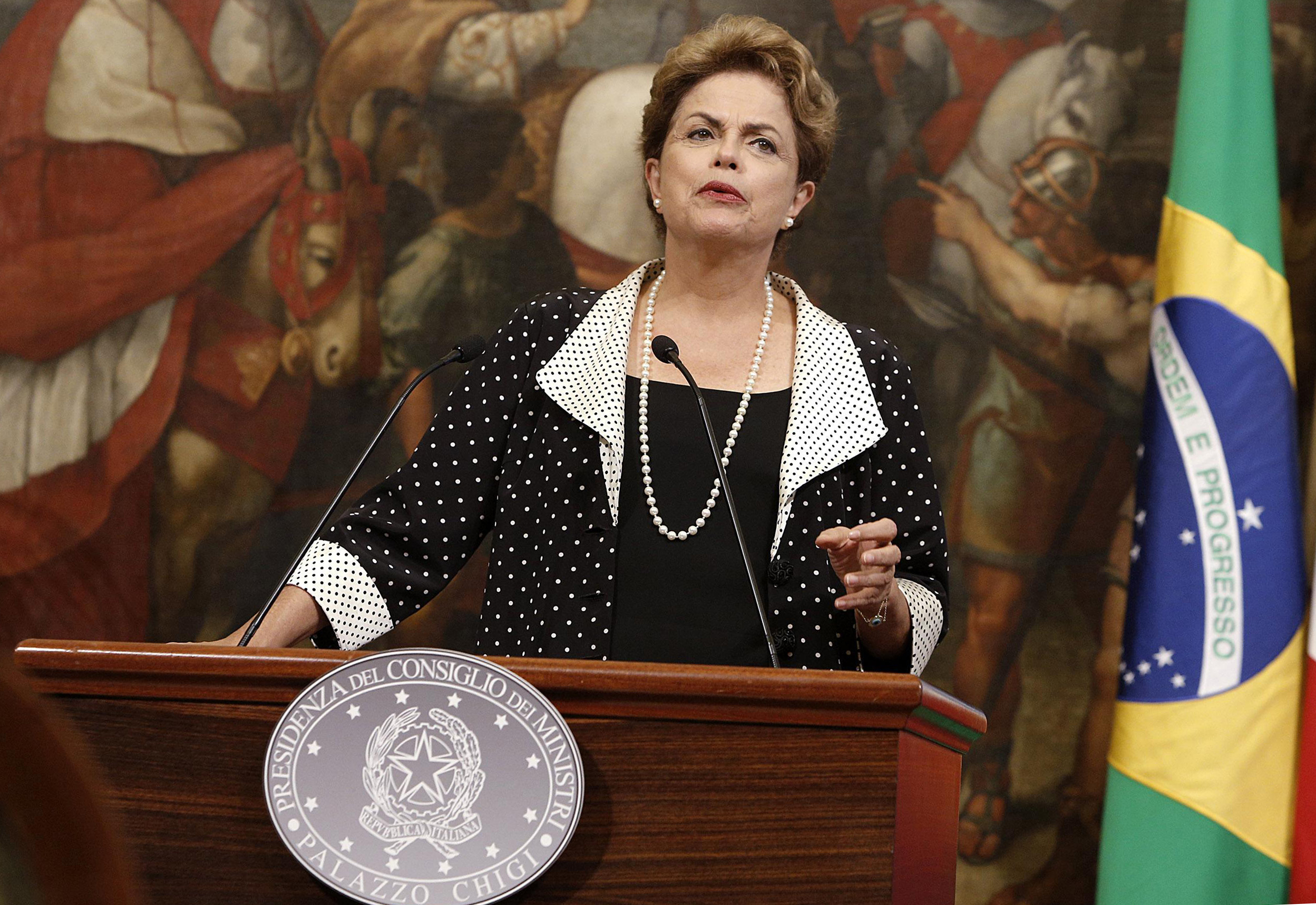 Brazilian President Dilma Rousseff speaks during a joint press conference with Italian Premier Matteo Renzi, at Chigi's Premier Palace in Rome on July 10, 2015. (Giuseppe Lami—AP)