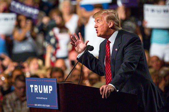Republican Presidential candidate Donald Trump addresses supporters during a political rally at the Phoenix Convention Center on July 11, 2015 in Phoenix, Arizona.