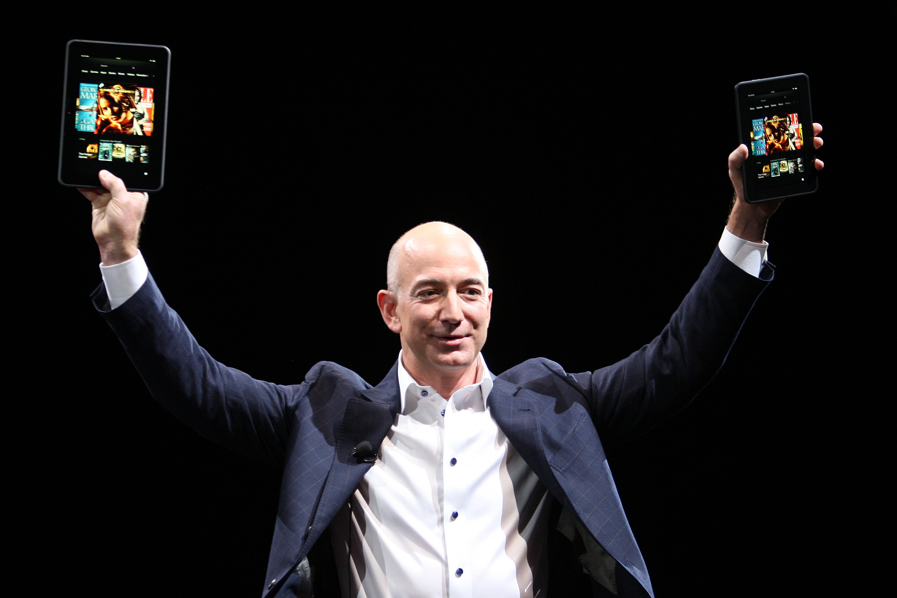 Amazon CEO Jeff Bezos holds up the new Kindle Fire HD reading device in two sizes during a press conference on September 6, 2012 in Santa Monica, California. (David McNew&mdash;Getty Images)
