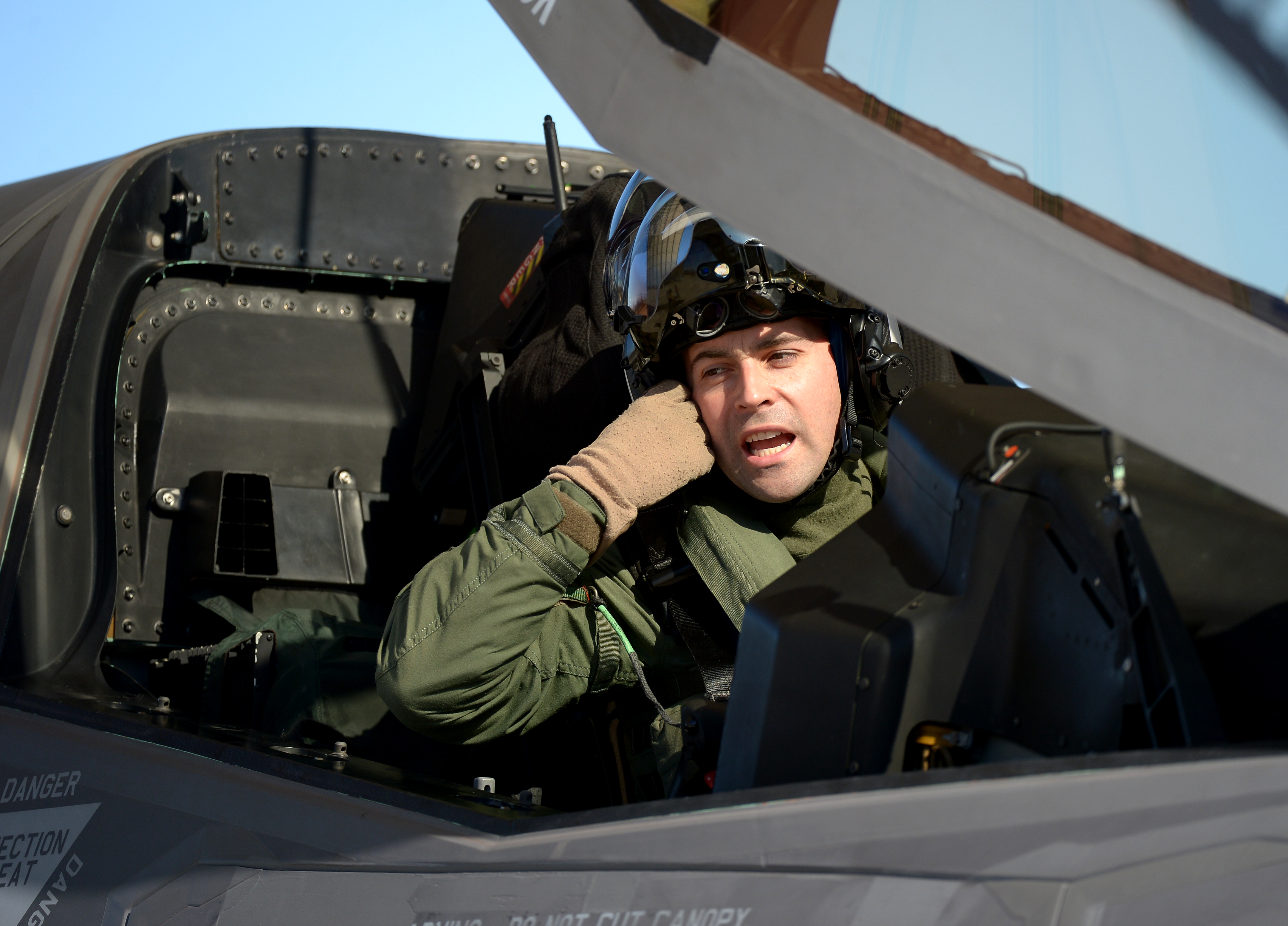 U.S. Marine Corps test pilot Maj. Richard Rusnok goes over his pre-flight check list in the cockpit of the  F-35B Lightning II aircraft BF-4p prior to a test flight at Naval Air Station Patuxent River on March 7, 2013 in Patuxent, MD (Jonathan Newton—The Washington Post/Getty Images)