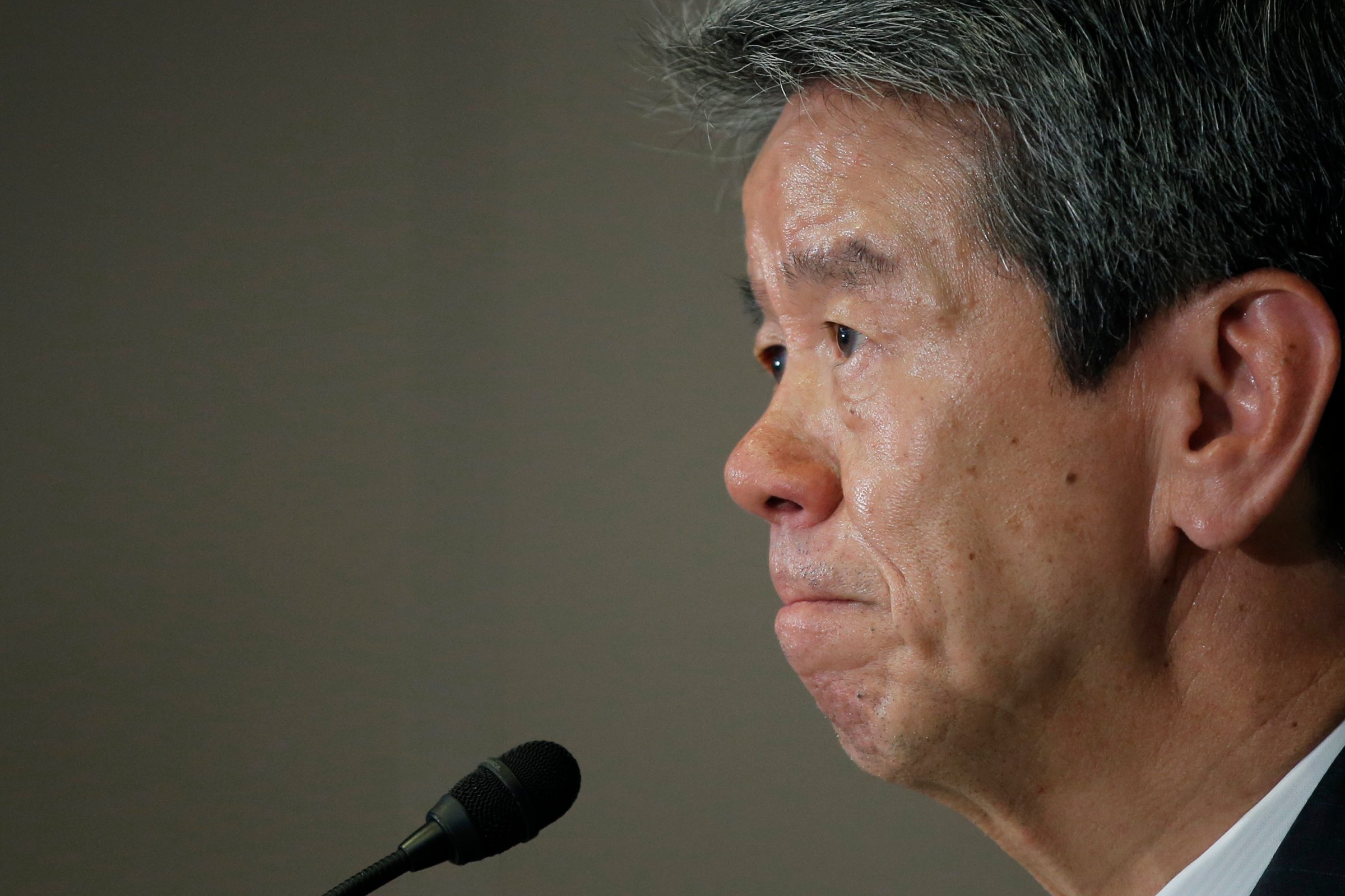 Hisao Tanaka, president and chief executive officer of Toshiba Corp., pauses during a news conference at the company's headquarters in Tokyo, Japan, on Friday, May 15, 2015. Toshiba Corp. named two lawyers and two certified public accountants to a third-party committee that is expanding an investigation started by an internal probe last month over accounting practices. Photographer: Kiyoshi Ota/Bloomberg *** Local Caption *** Hisao Tanaka