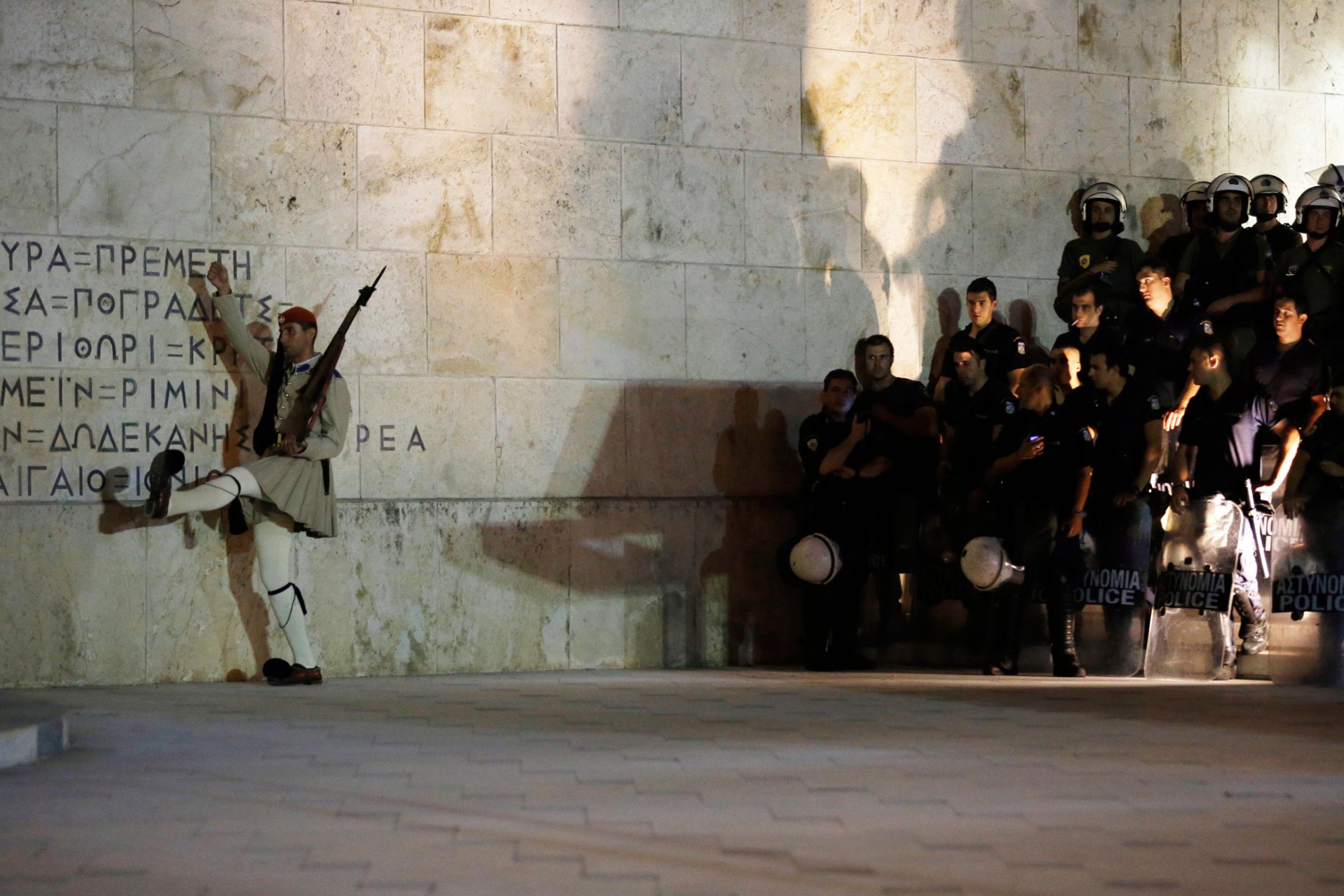 Greek special forces members guard the Parliament in Syntagma Square after the referendum in Athens.