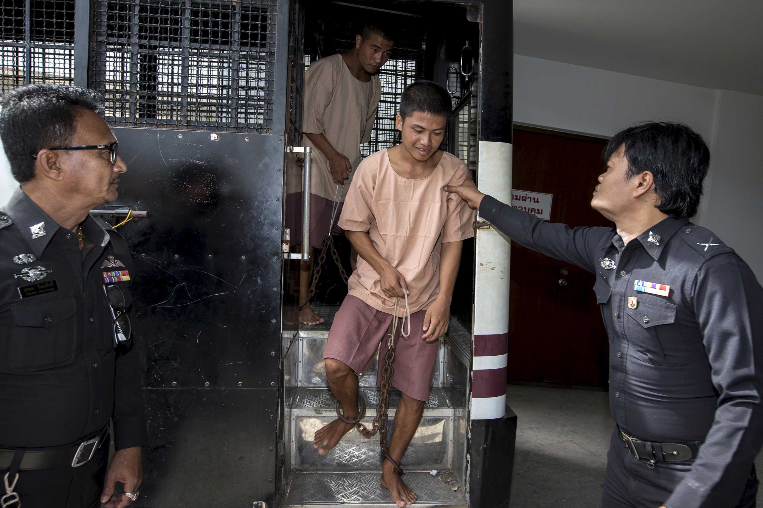 Burmese migrant workers Wai Phyo and Zaw Lin arrive at the Koh Samui Provincial Court, in Koh Samui, Thailand, on July 8, 2015 (Athit Perawongmetha—Reuters)